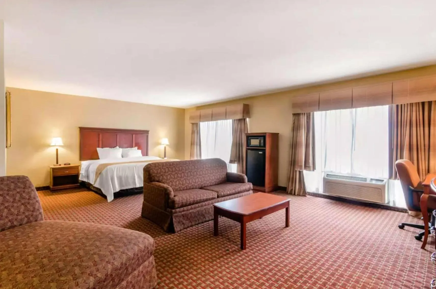 Living room, Bed in Precious Hotel