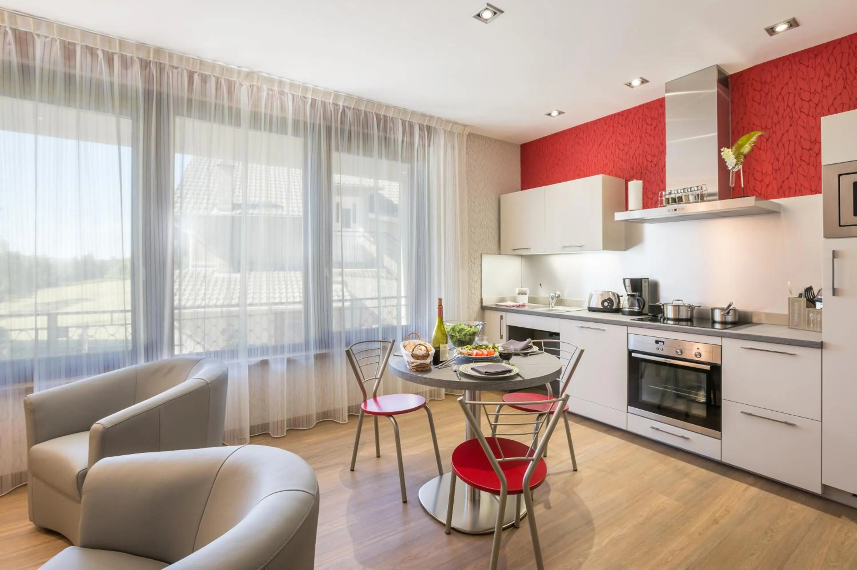 Kitchen or kitchenette in Logis Hôtel Le Relais du Bois Vialotte