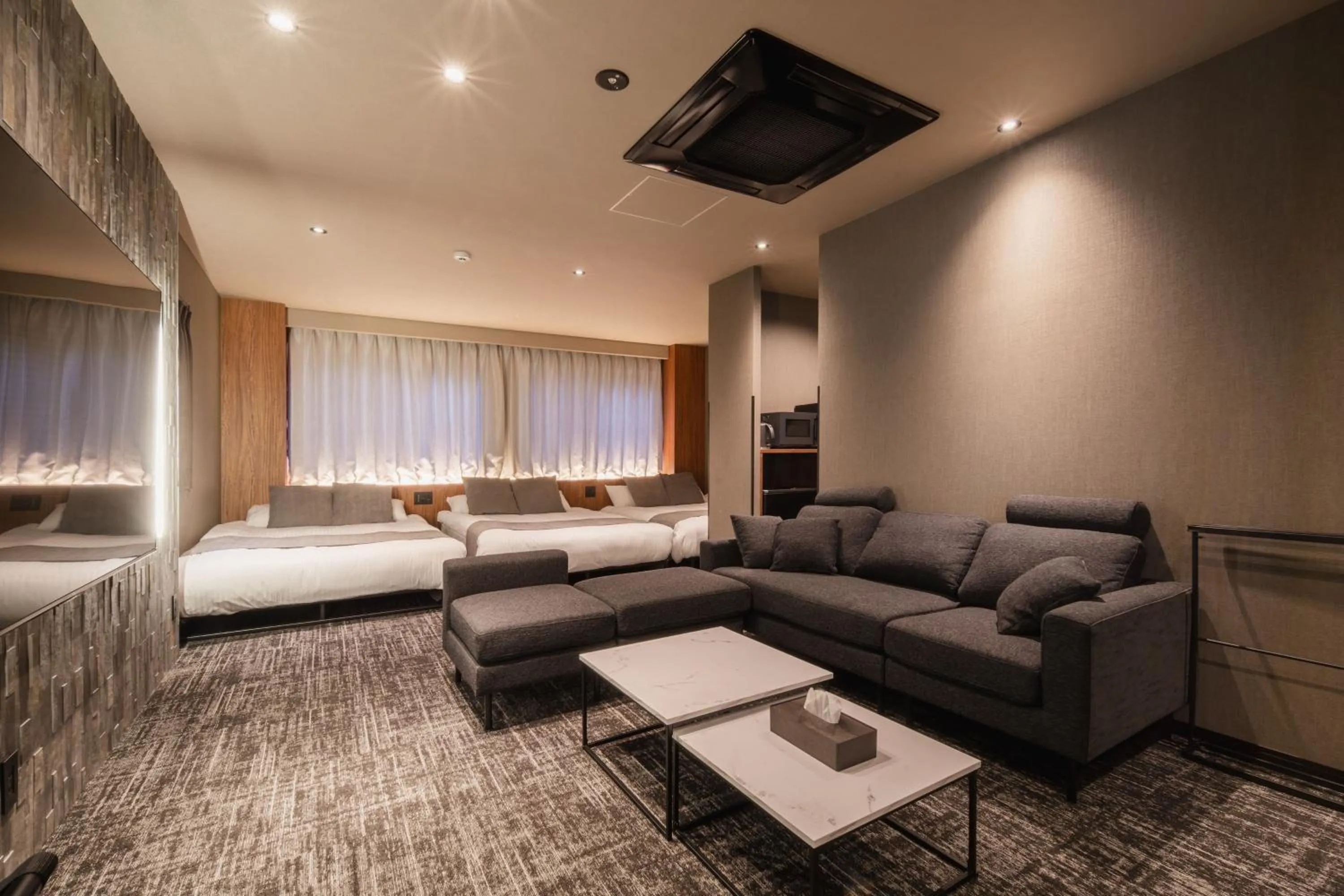 Living room, Bed in The LOFT INN HAKATA