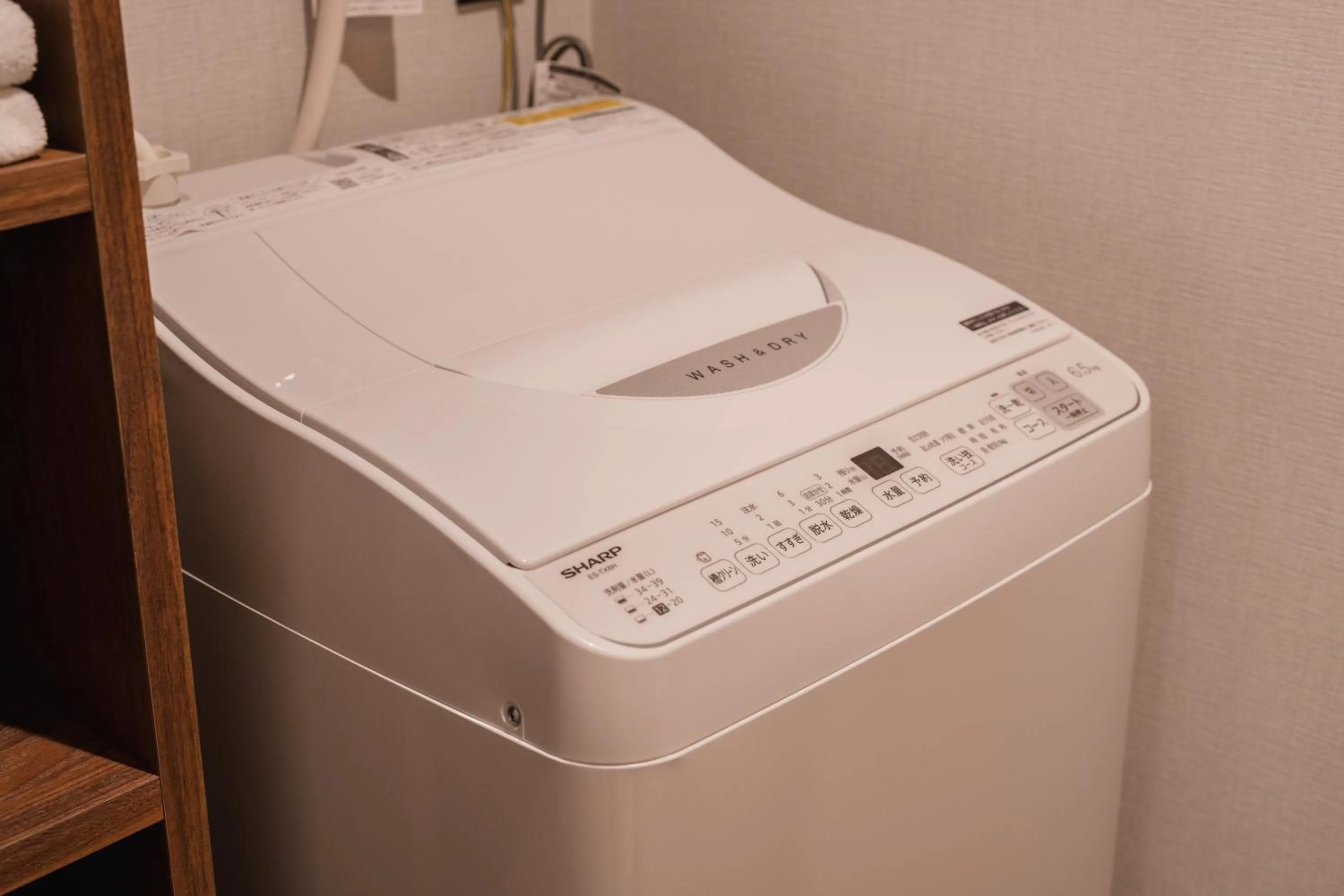 washing machine in The LOFT INN HAKATA