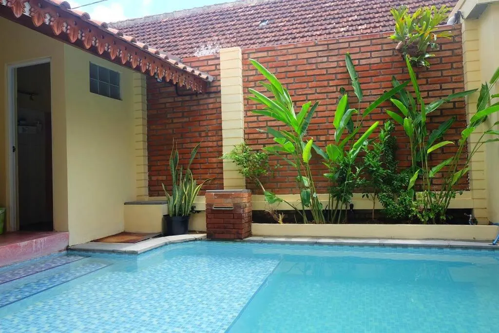 Pool view in Sabi House Lesmana 2 by Simply Homy