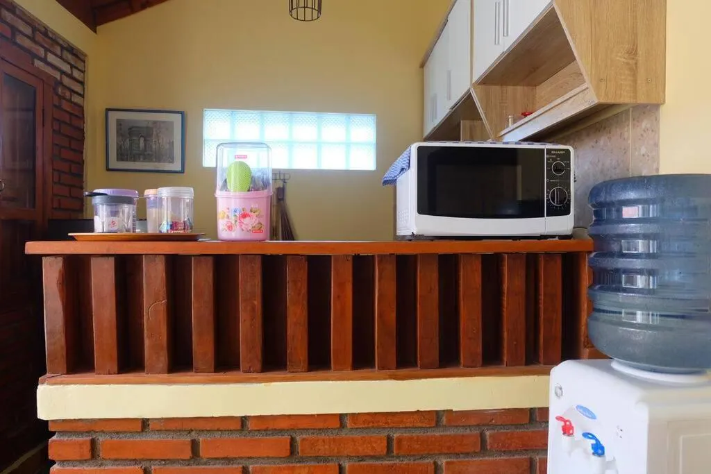 Coffee/tea facilities in Sabi House Lesmana 2 by Simply Homy