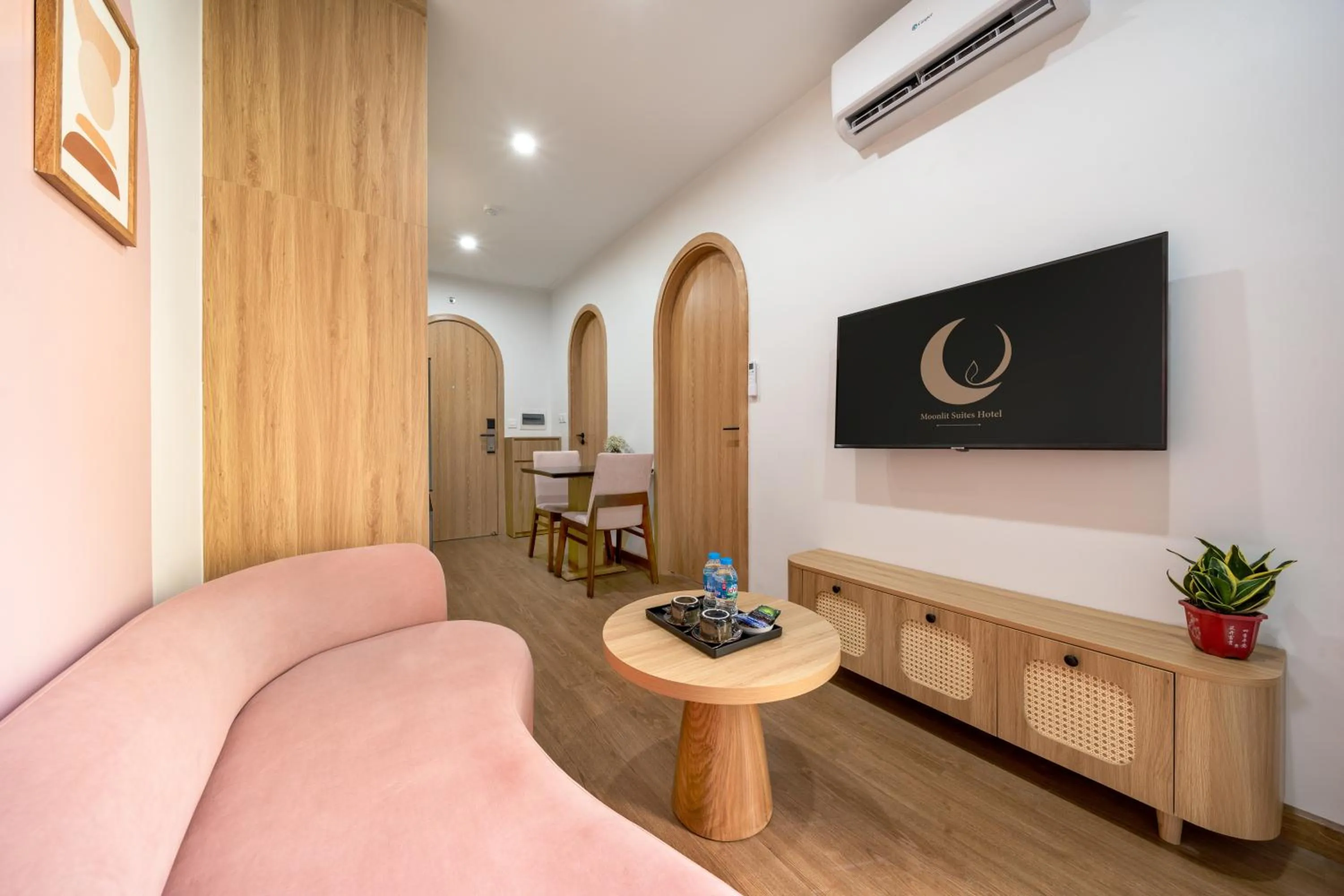 TV and multimedia in MOONLIT Suites Hotel by Luxe Paradise