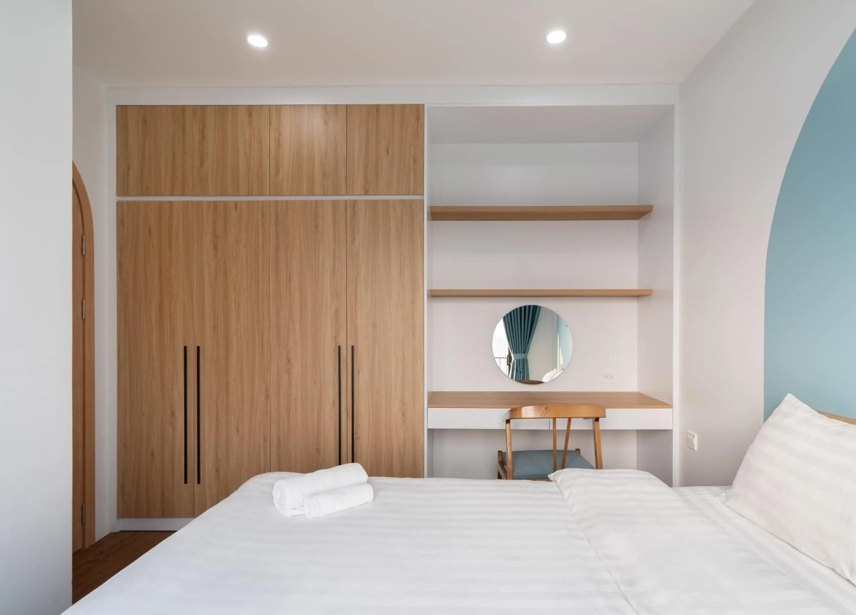 wardrobe, Bed in MOONLIT Suites Hotel by Luxe Paradise