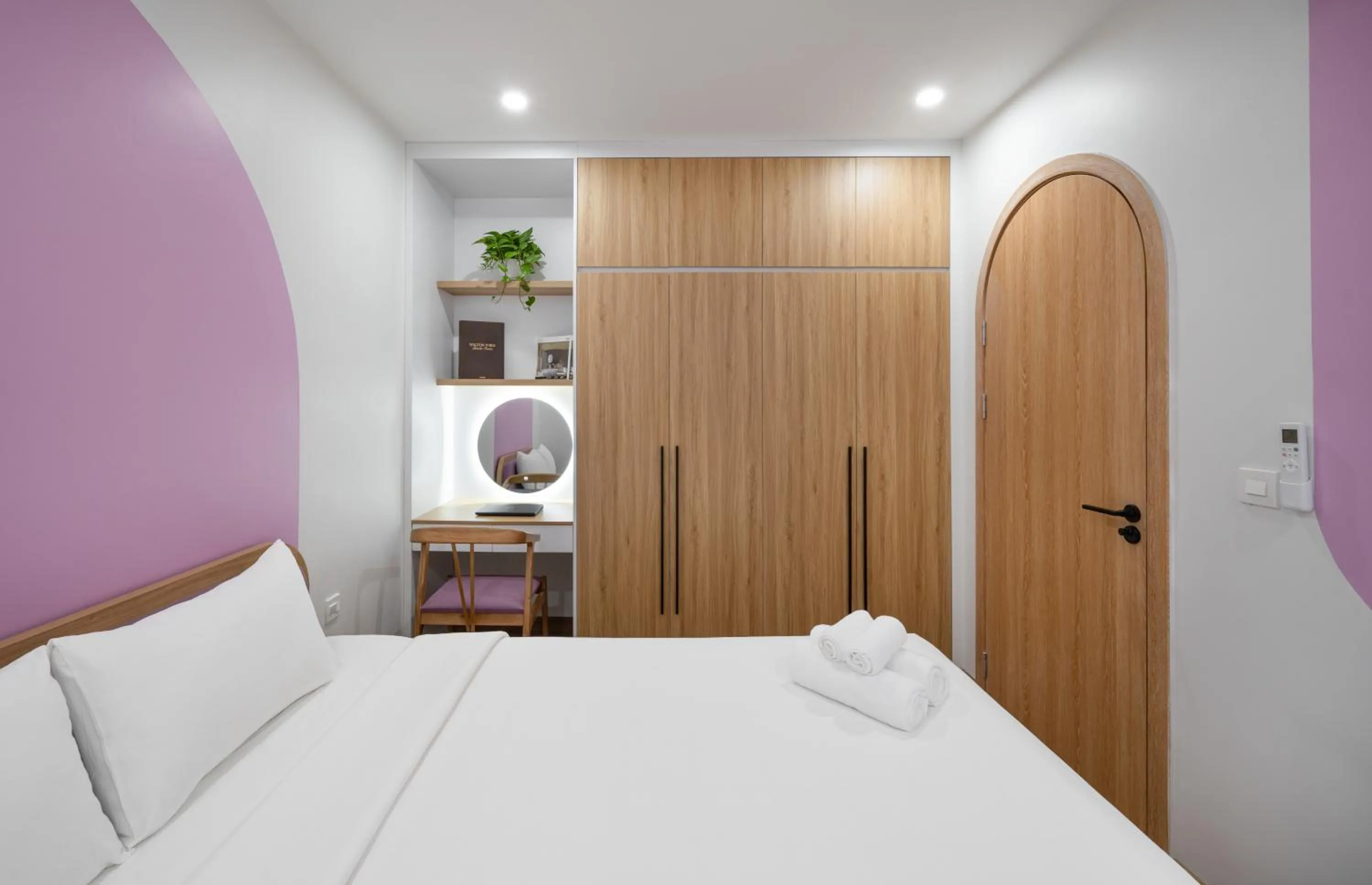 Bed in MOONLIT Suites Hotel by Luxe Paradise