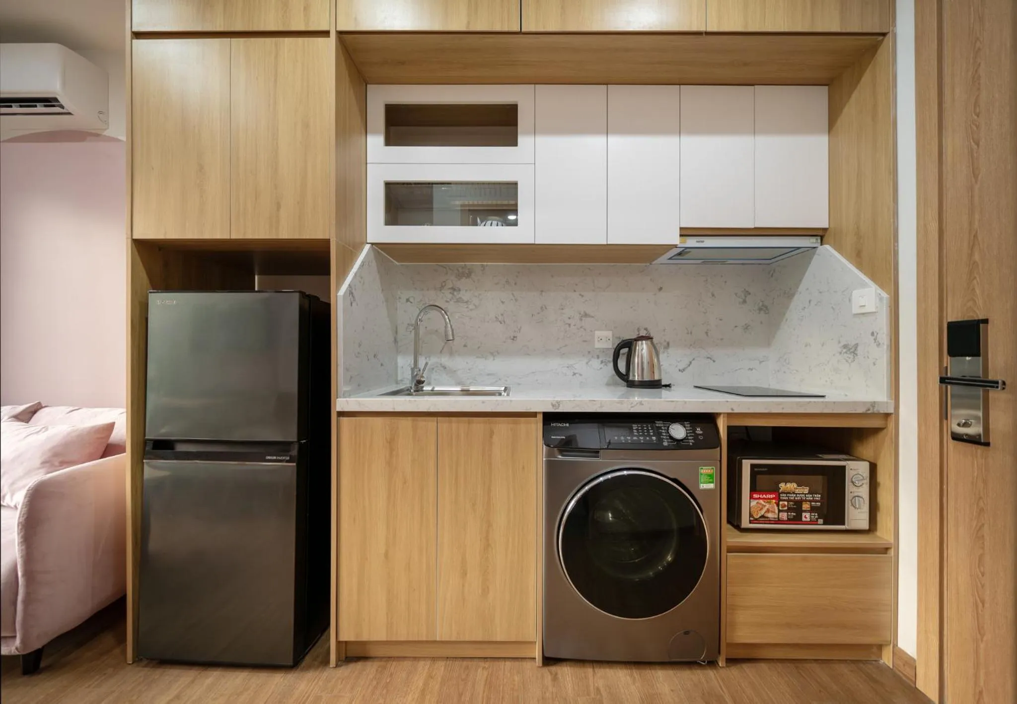 kitchen in MOONLIT Suites Hotel by Luxe Paradise