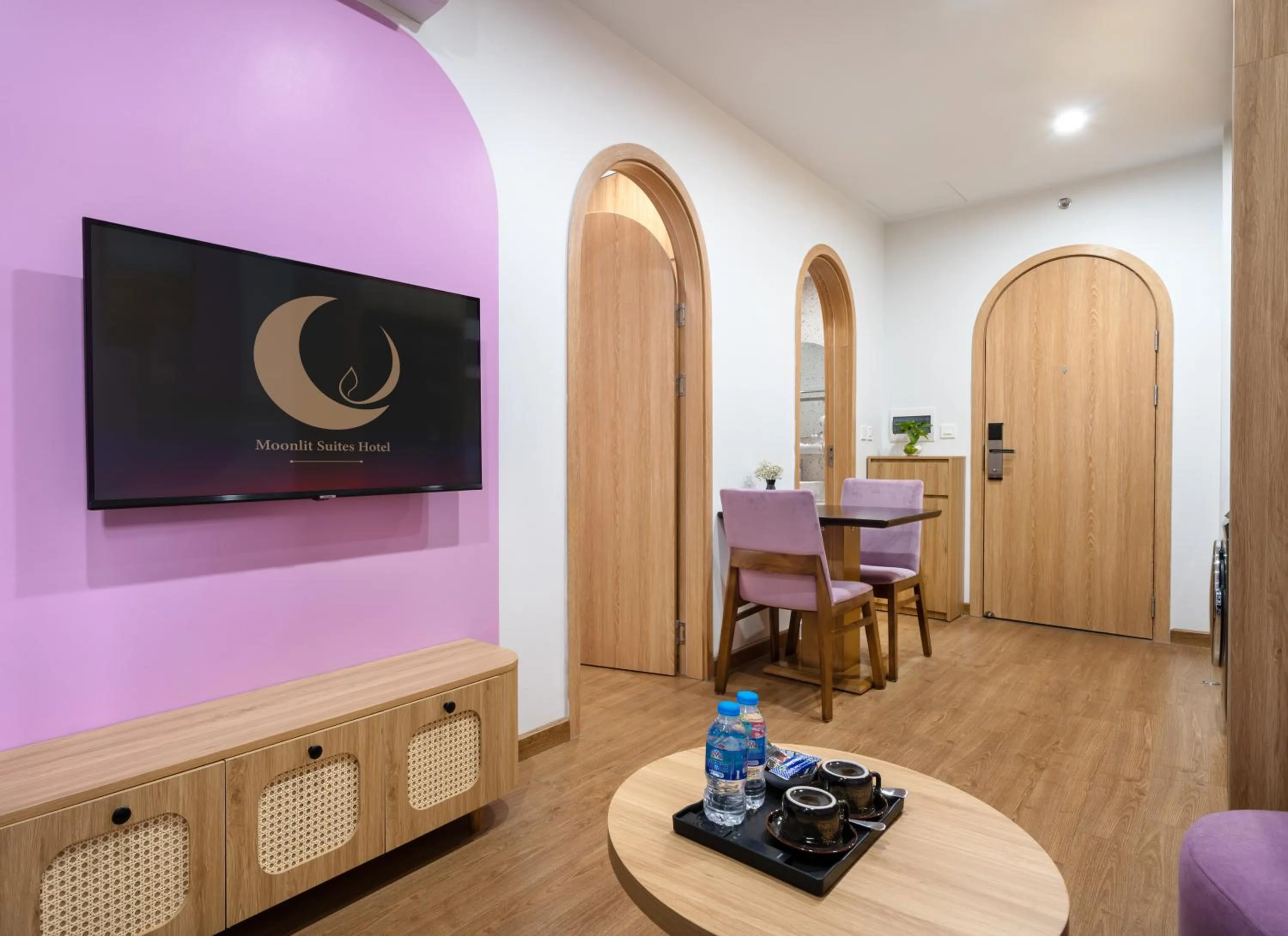 TV and multimedia in MOONLIT Suites Hotel by Luxe Paradise