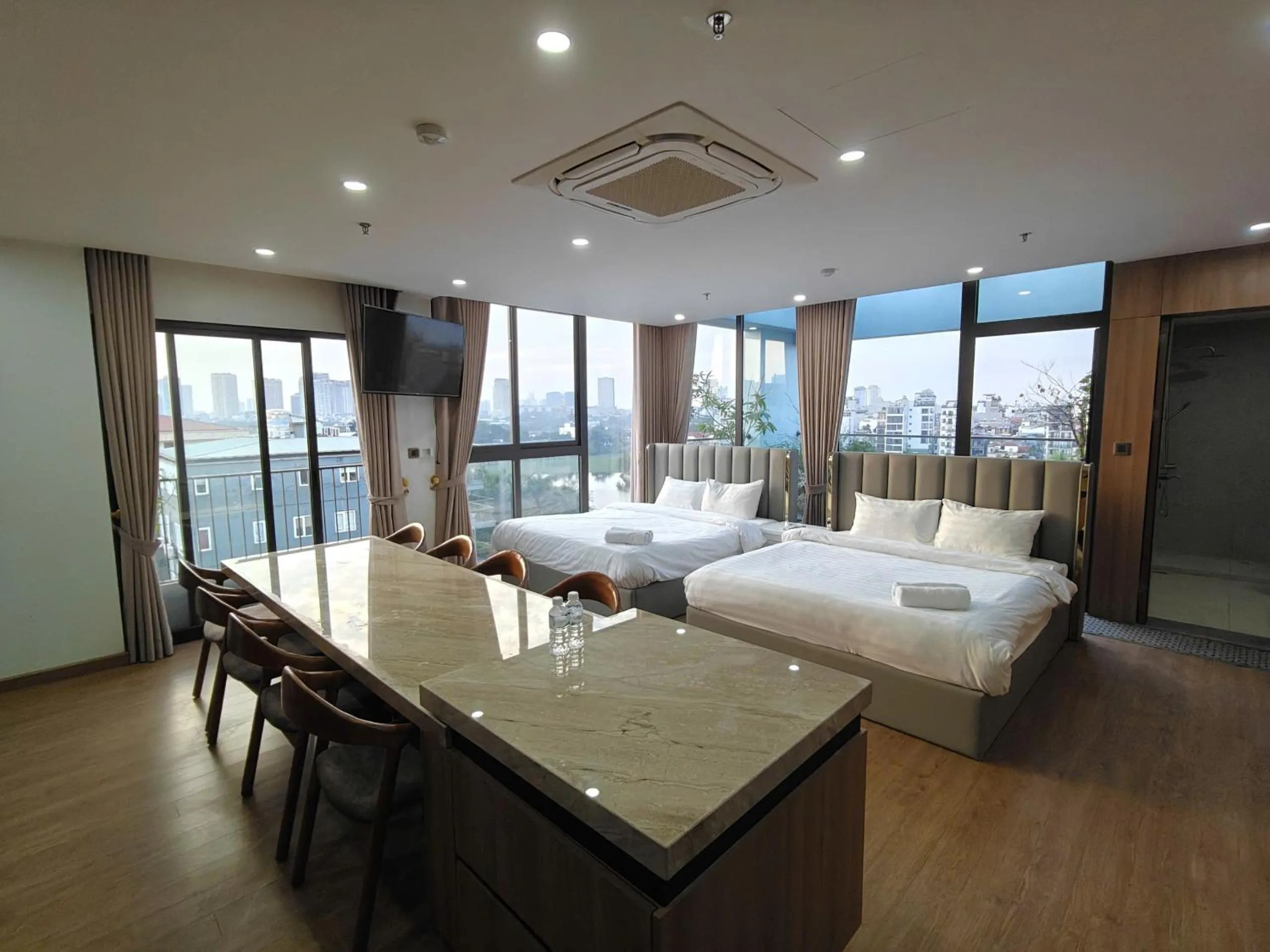 Photo of the whole room, Bed in MOONLIT Suites Hotel by Luxe Paradise