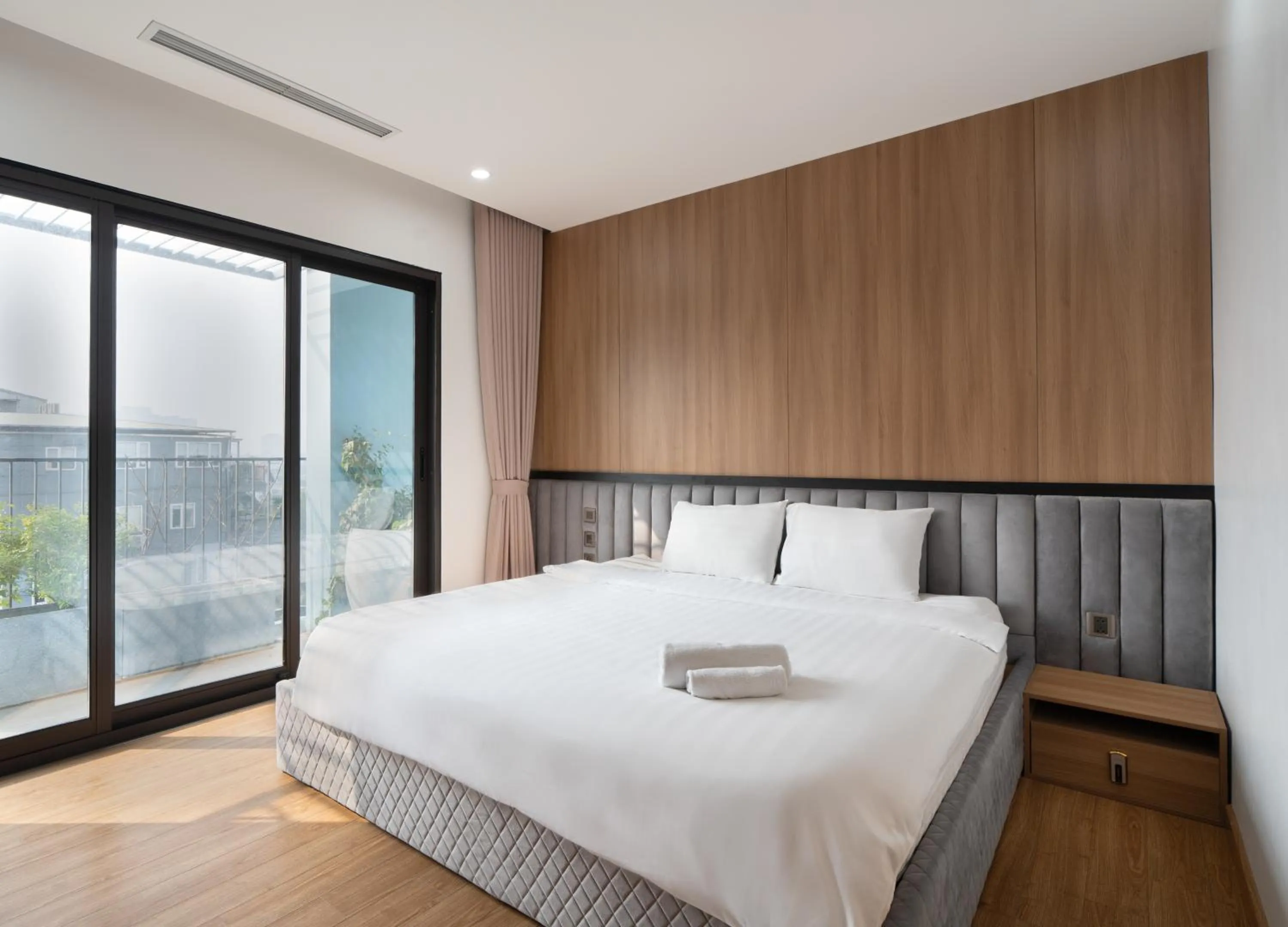 Bed in MOONLIT Suites Hotel by Luxe Paradise