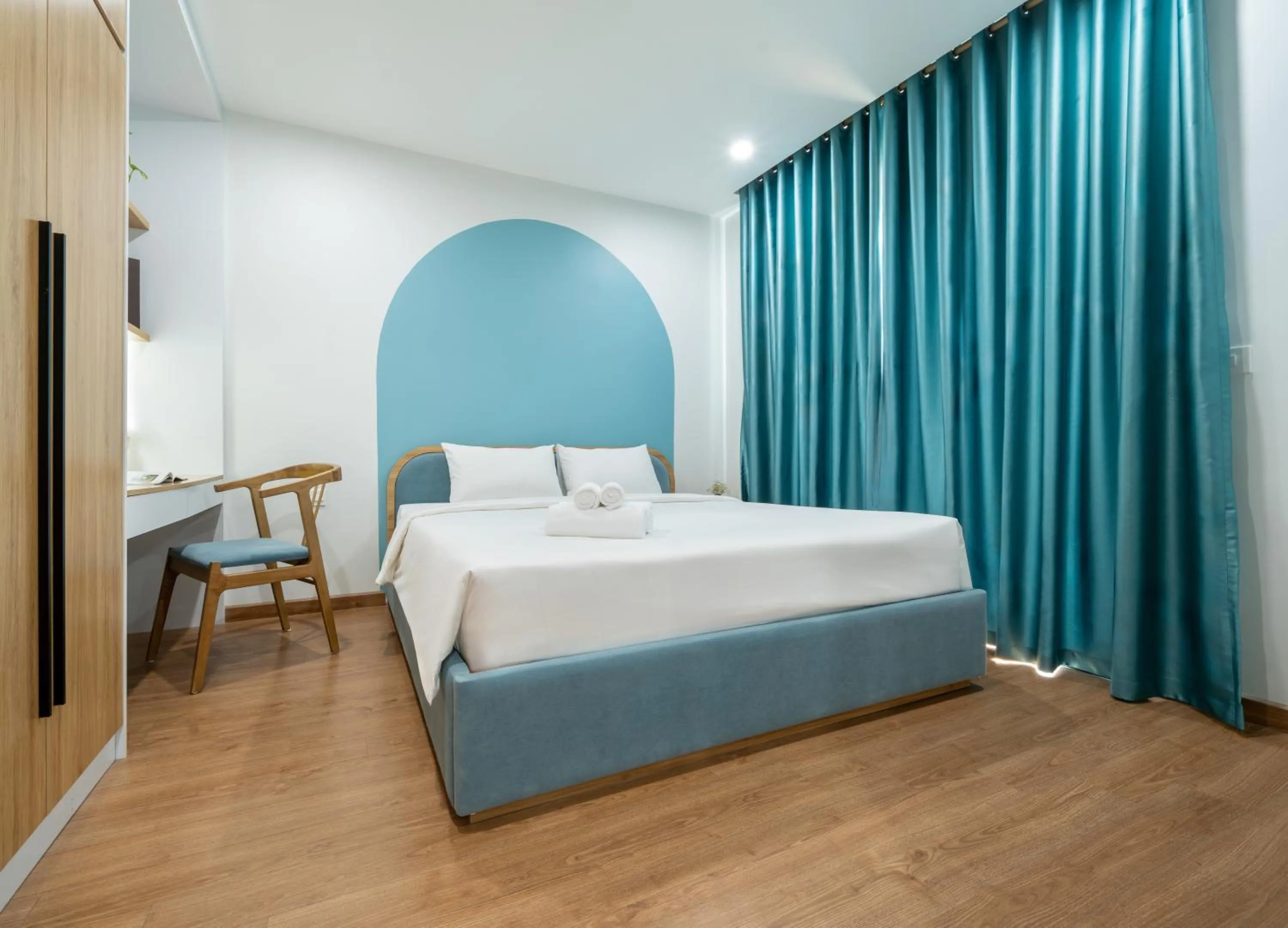 Bed in MOONLIT Suites Hotel by Luxe Paradise