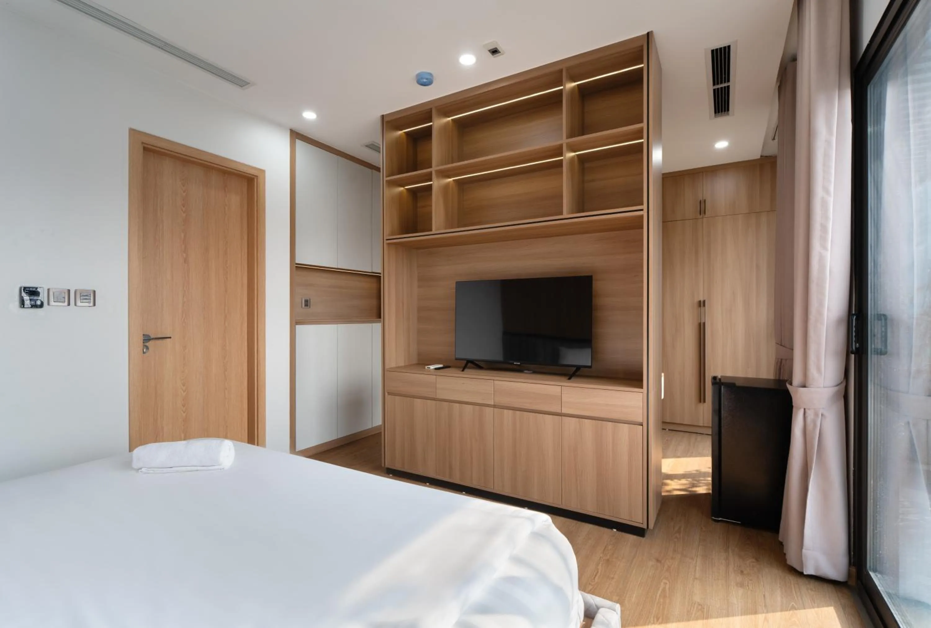 Bed in MOONLIT Suites Hotel by Luxe Paradise