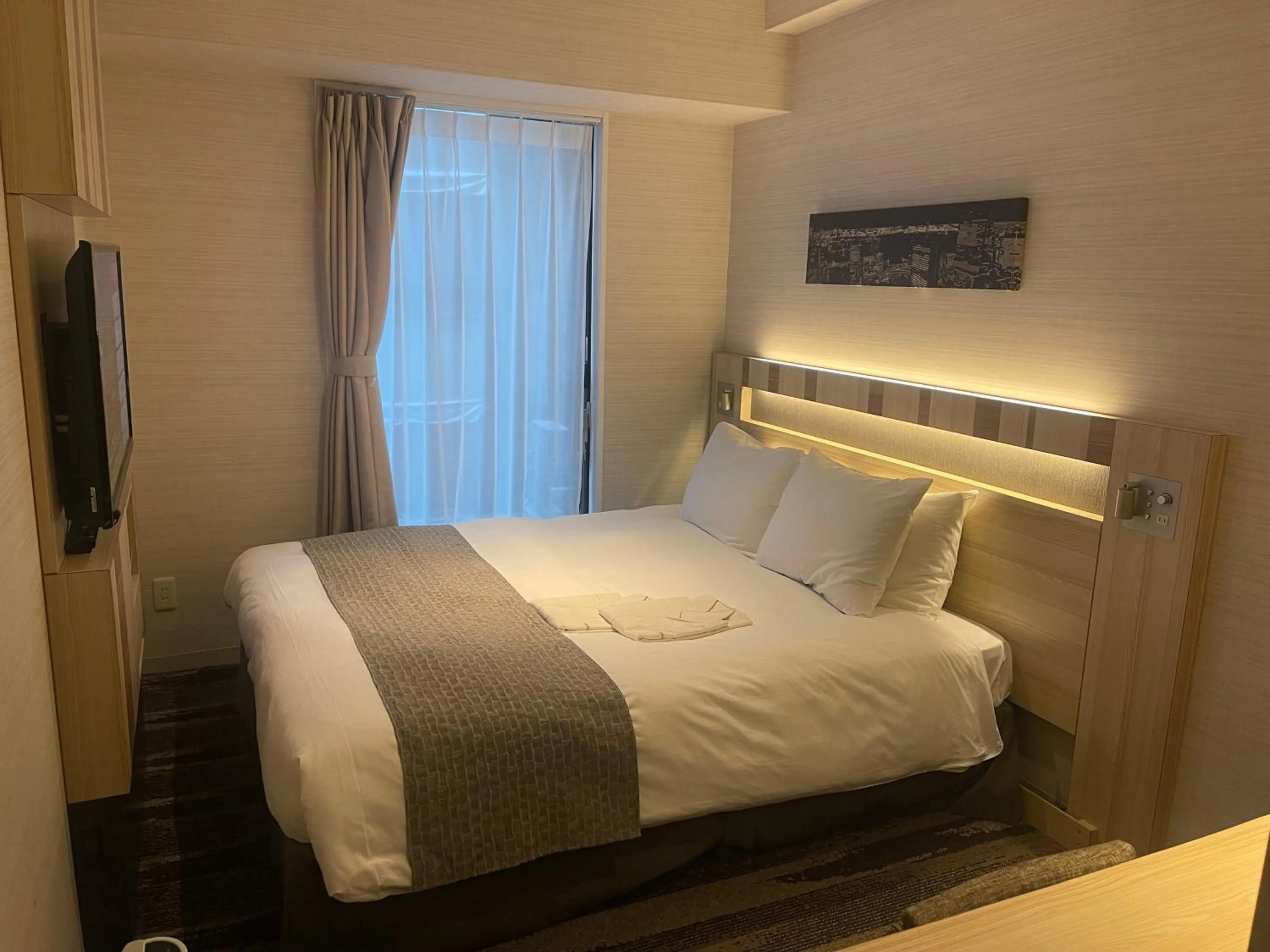 Bed in Hotel Sunroute Ginza