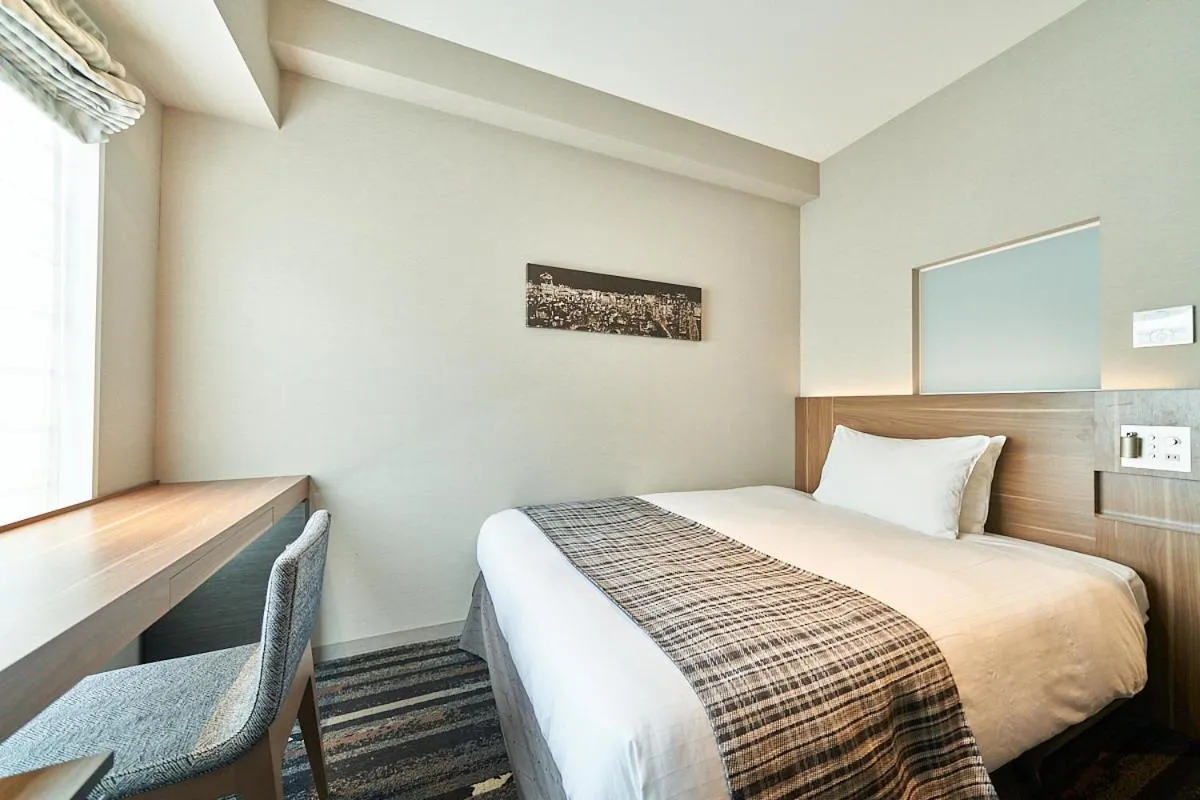 Bed in Hotel Sunroute Ginza