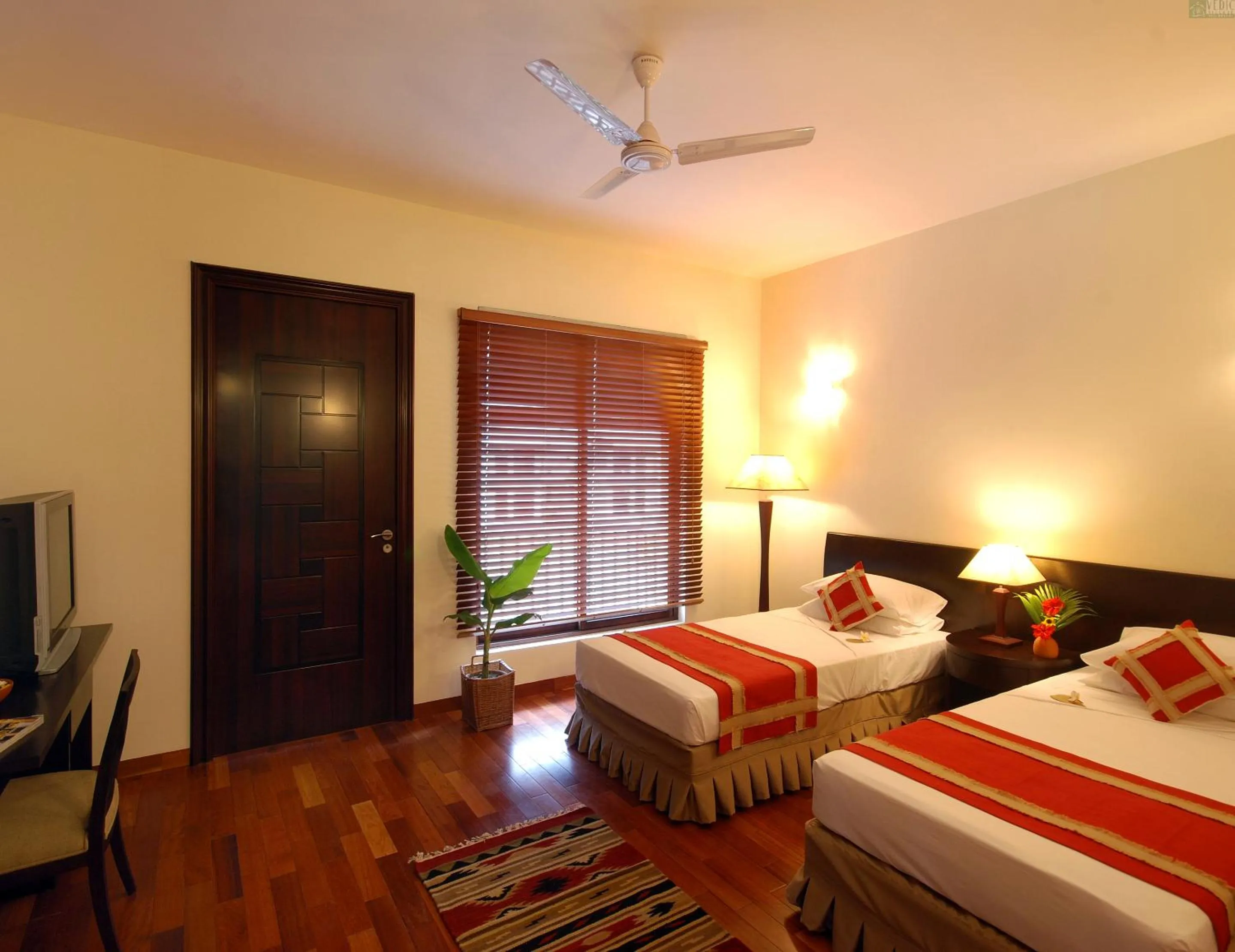 Bed in Vedic Village Spa Resort Kolkata