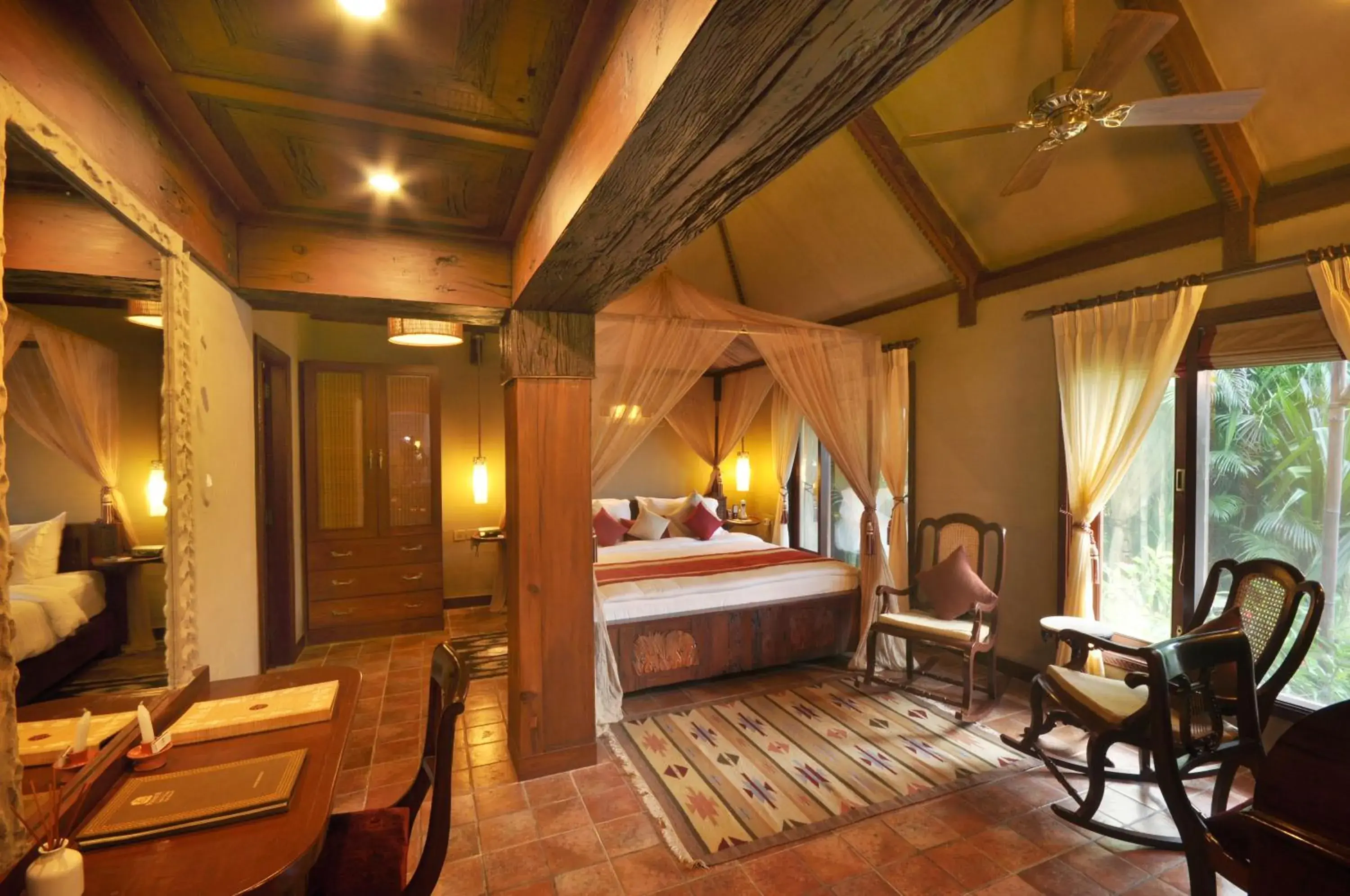 Seating area, Bed in Vedic Village Spa Resort Kolkata Seating area, Bed in Vedic Village Spa Resort Kolkata