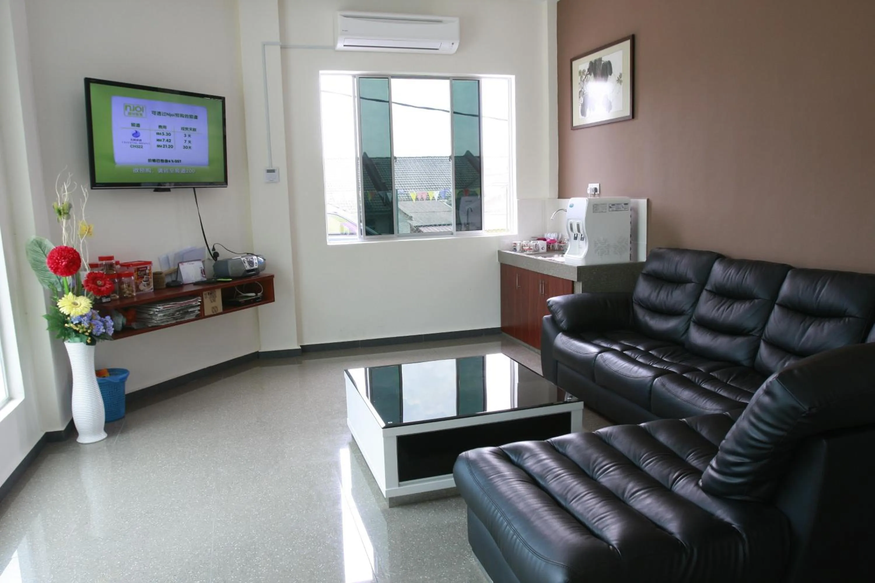 Communal lounge/ TV room in Alor Villa