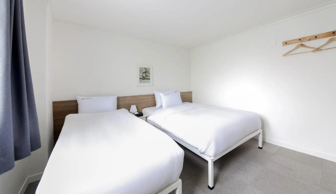Bed in Gaon J Stay Hotel
