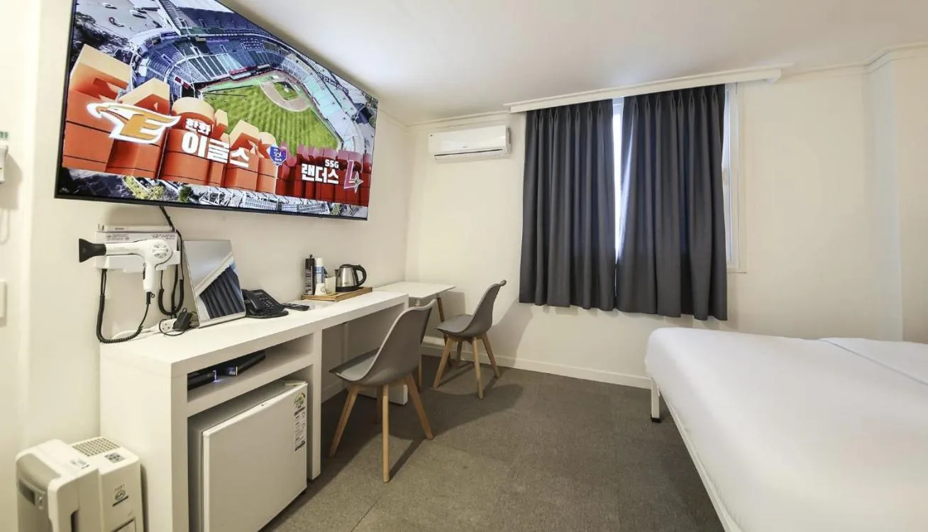 Bed in Gaon J Stay Hotel