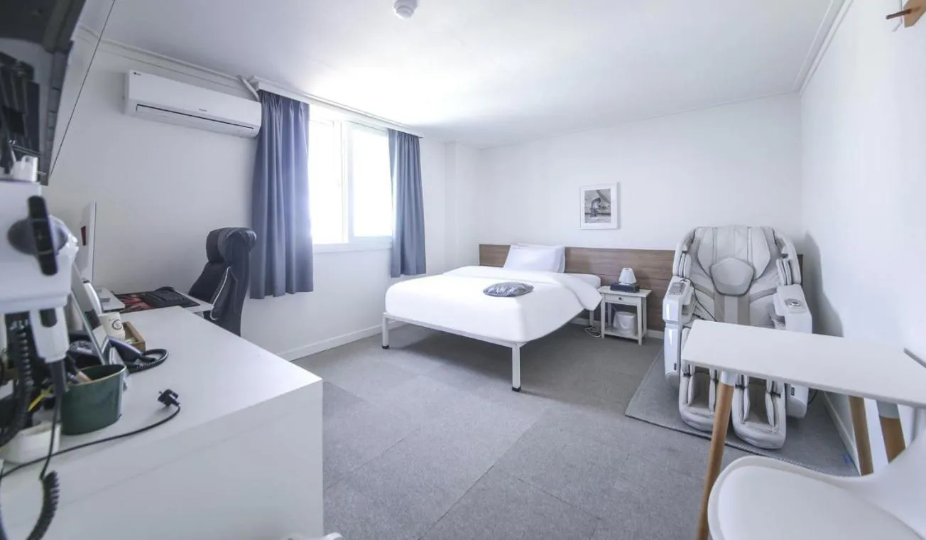 Bed in Gaon J Stay Hotel