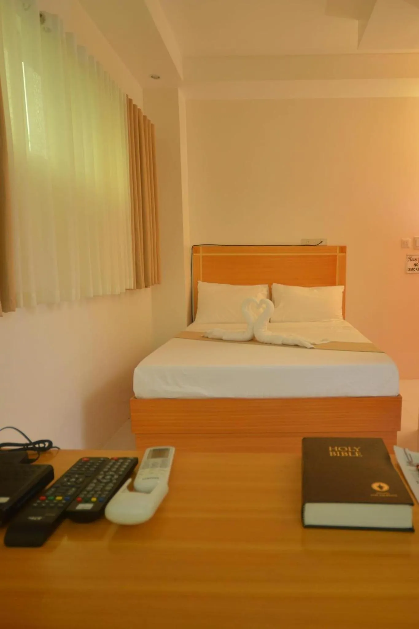 Bed in Cherry's Courtyard Hotel