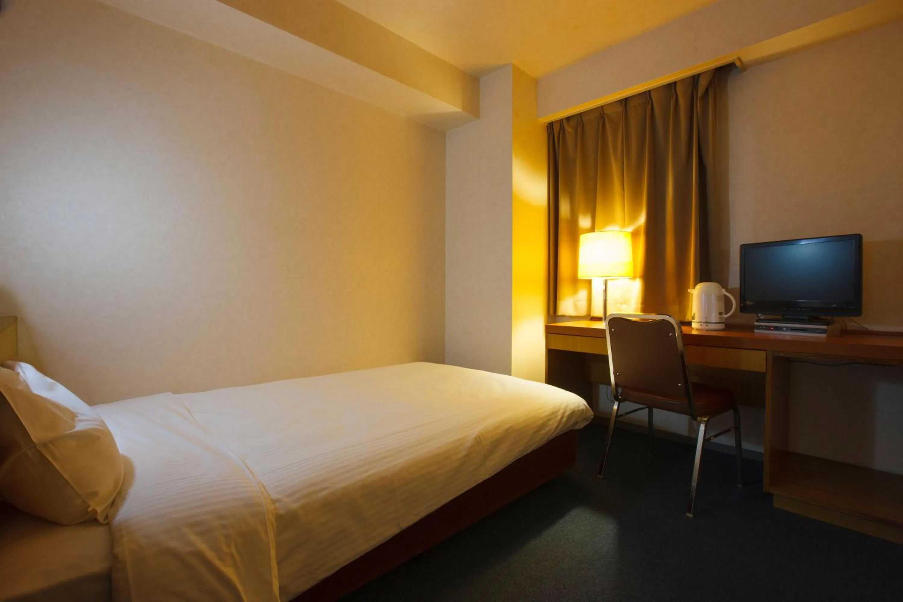 Bed in Sankei City Hotel Hachioji