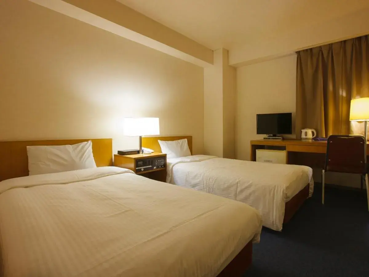 Bed in Sankei City Hotel Hachioji Bed in Sankei City Hotel Hachioji