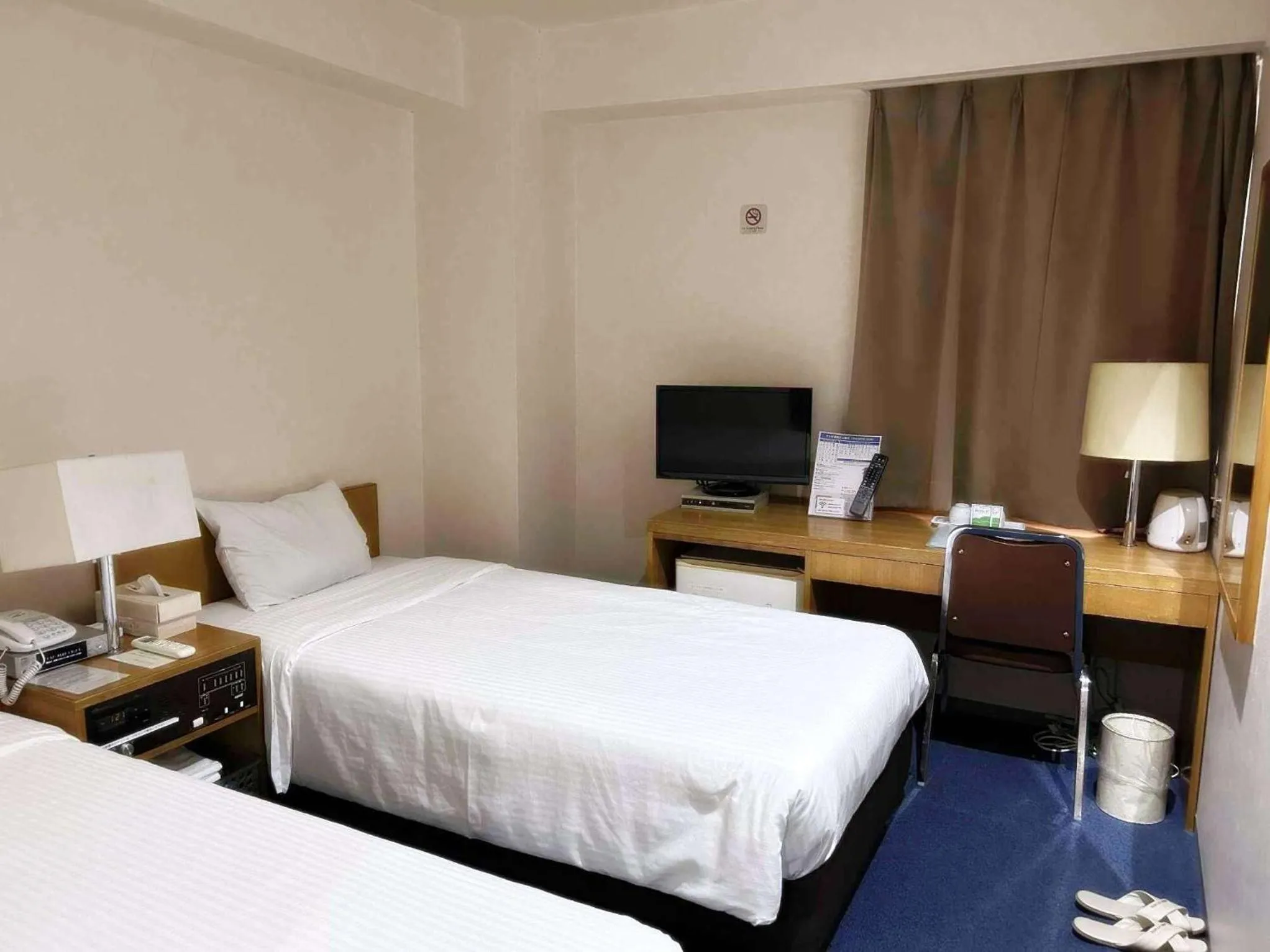 Bed in Sankei City Hotel Hachioji