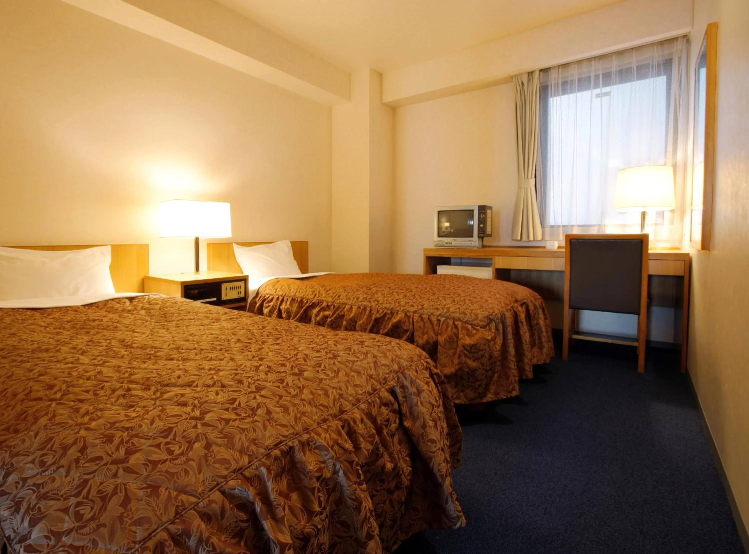 Bed in Sankei City Hotel Hachioji