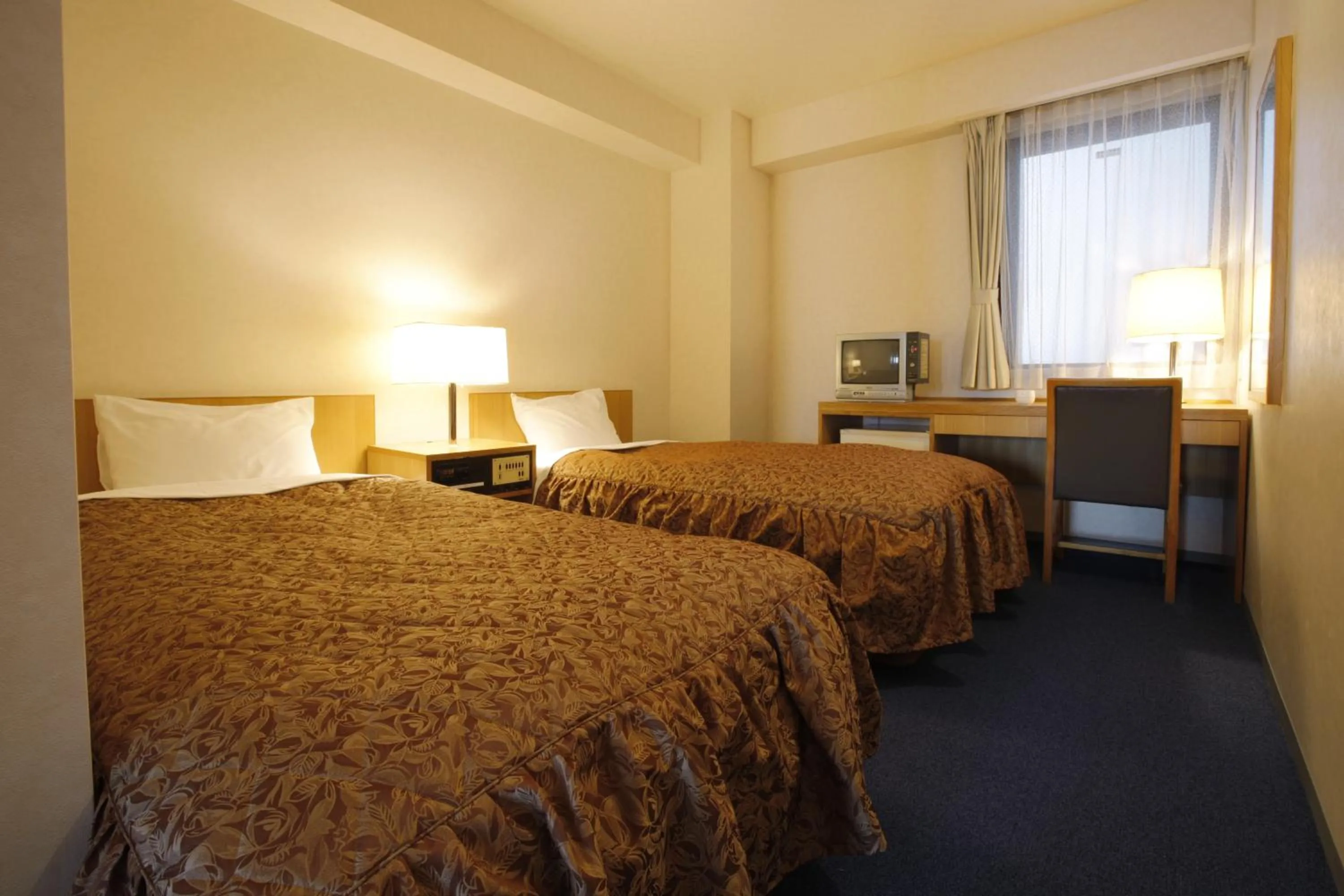 Bed in Sankei City Hotel Hachioji