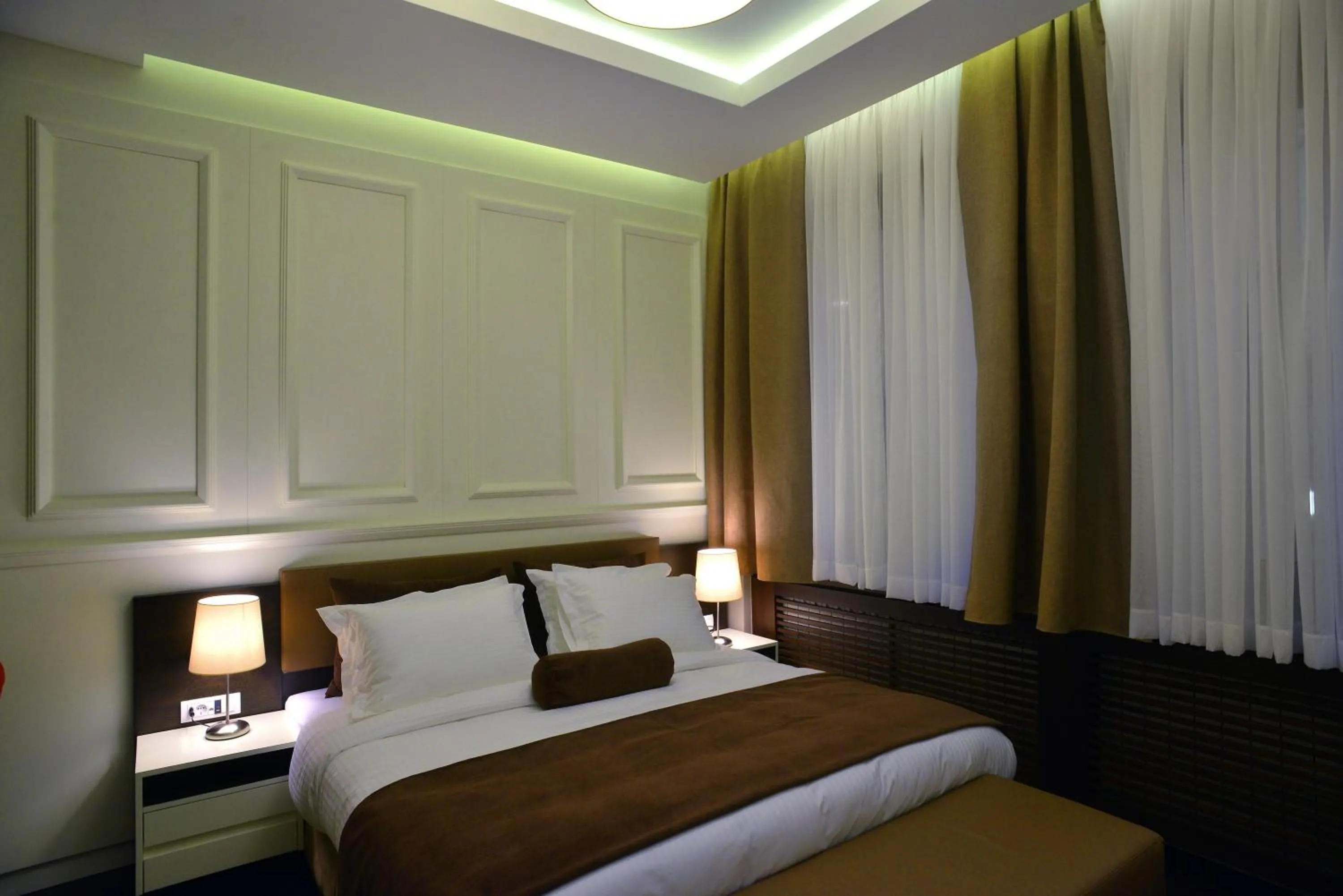 Bed in Belgreat Premium Suites