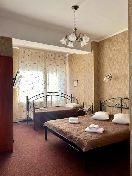 Triple Room with Balcony in Golden Lion Hotel