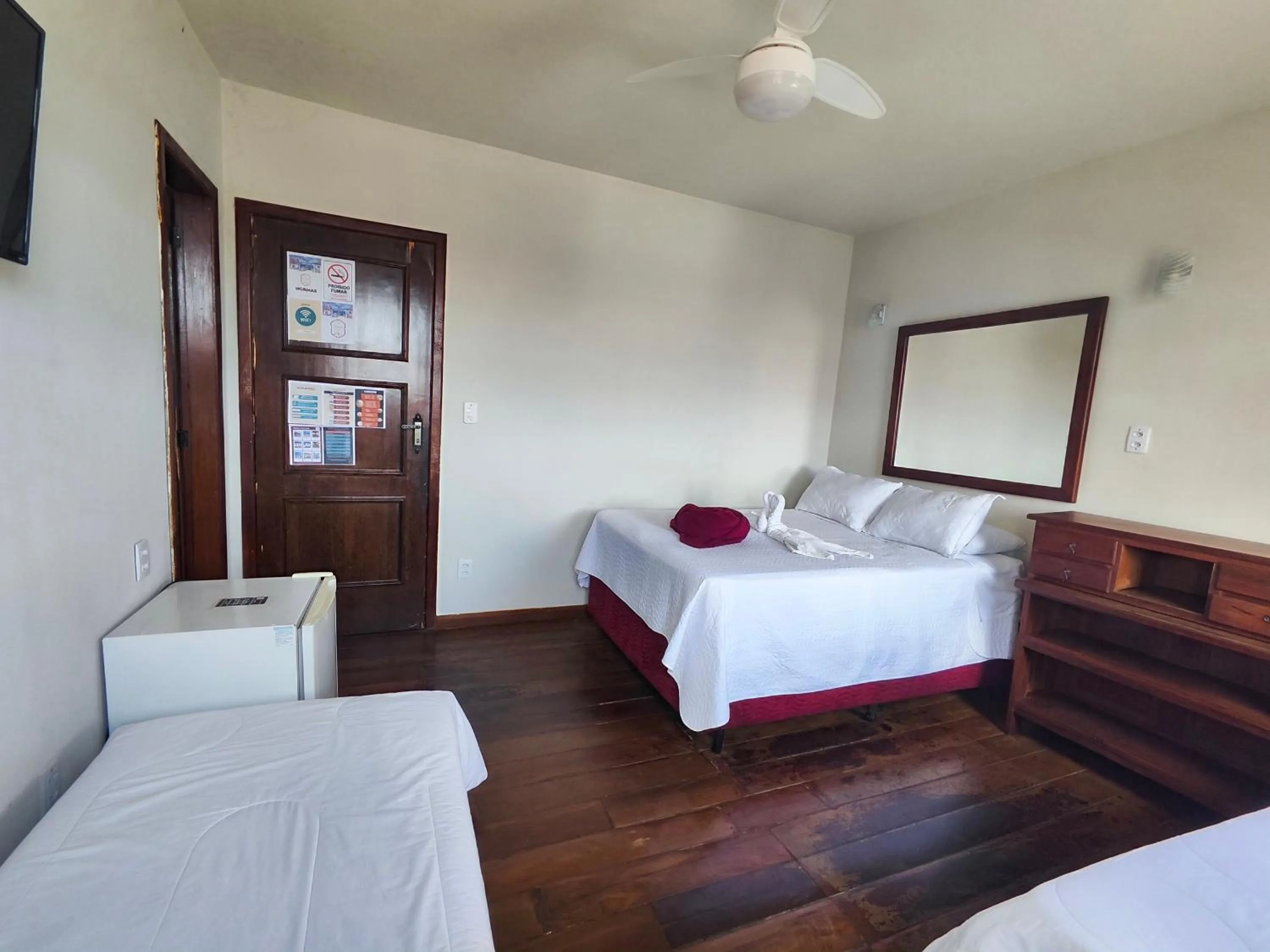 Bed in Pousada Flor de Lis