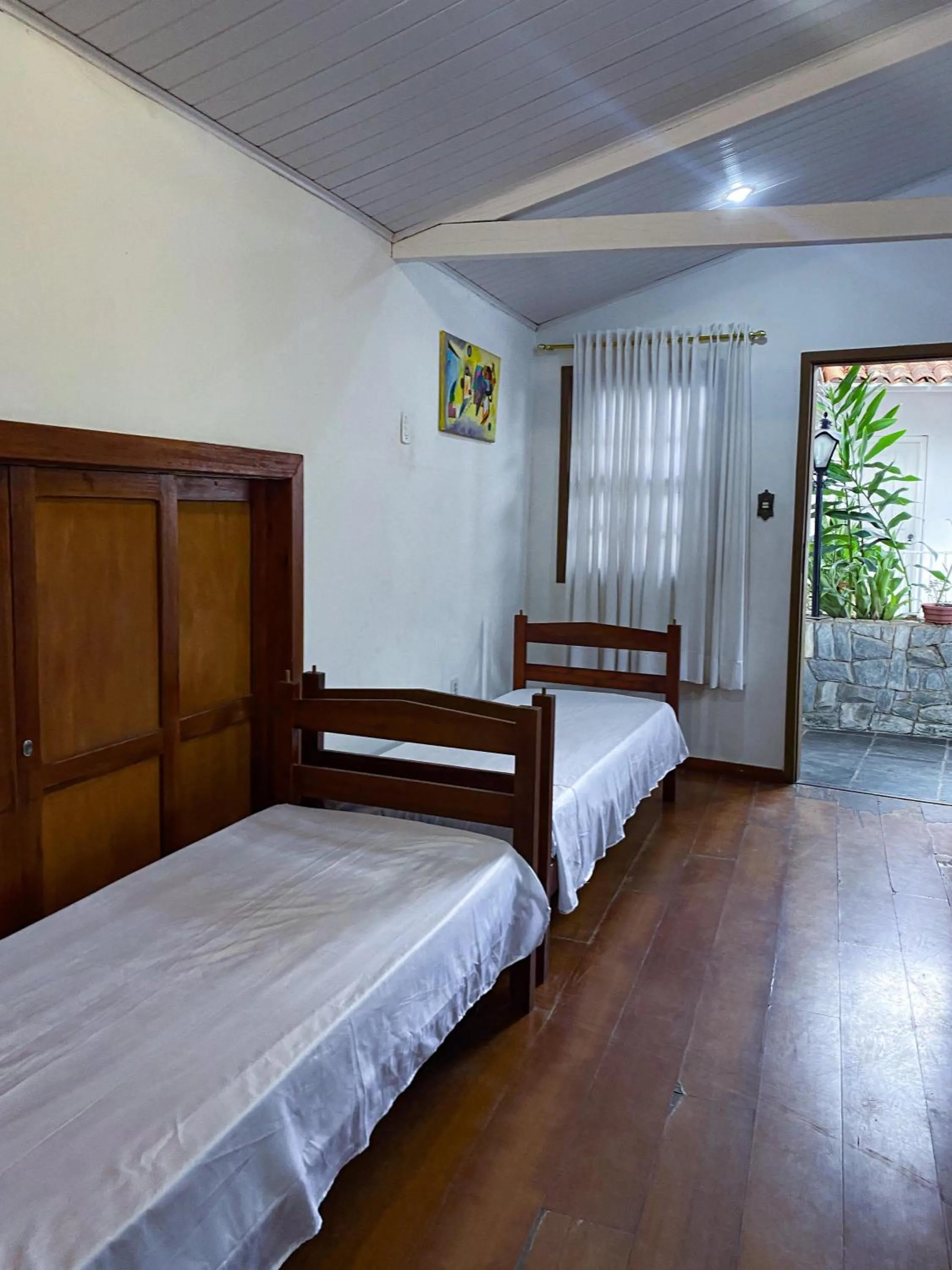 Bed in Pousada Flor de Lis