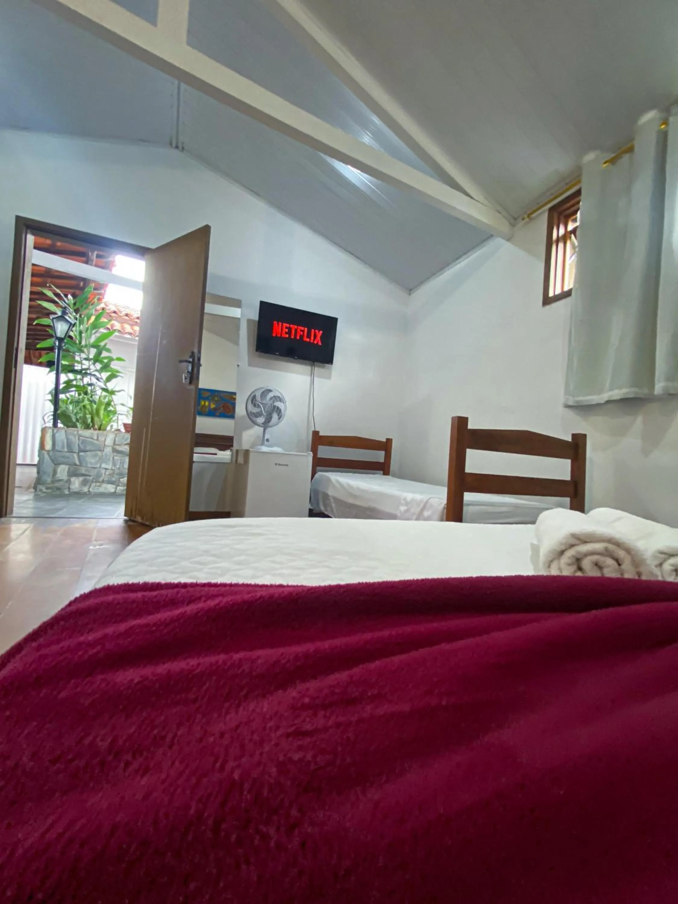 Bed in Pousada Flor de Lis