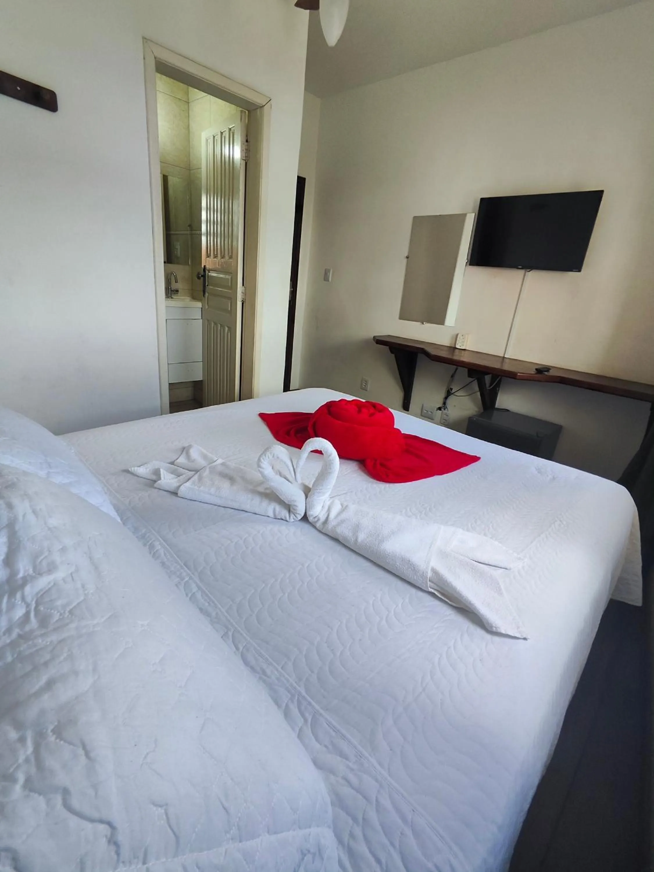 Bed in Pousada Flor de Lis