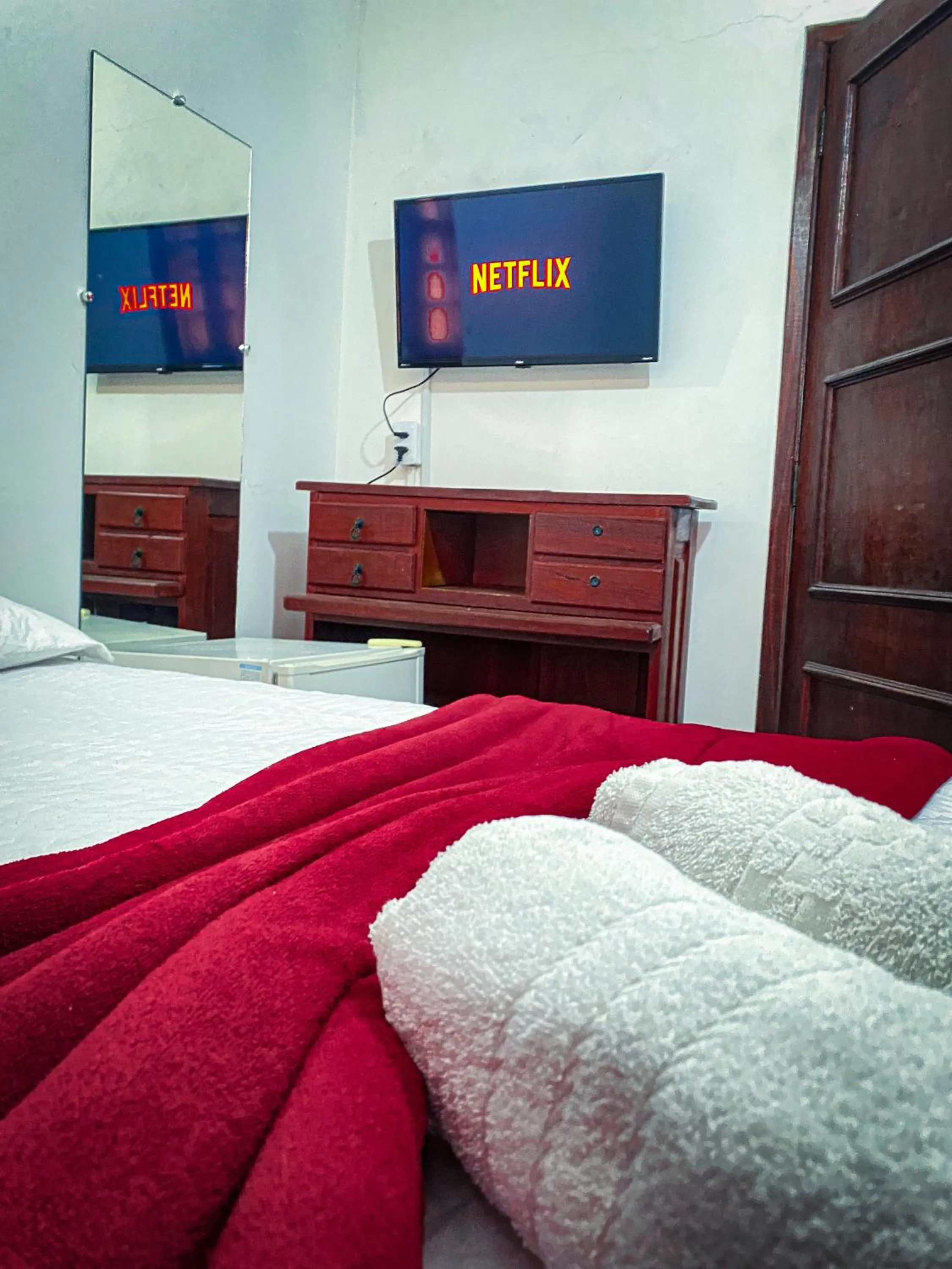 Bed in Pousada Flor de Lis