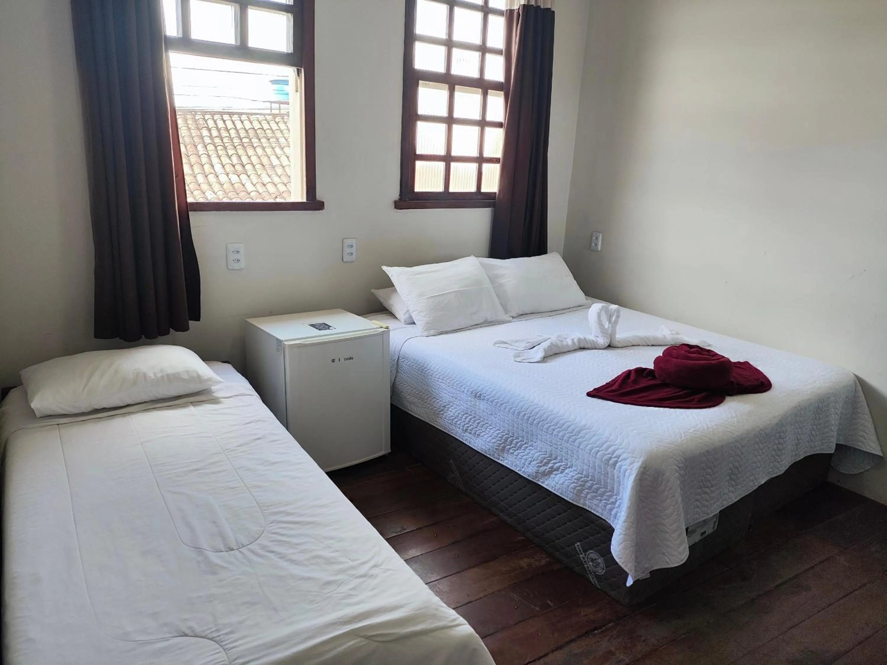 Bed in Pousada Flor de Lis