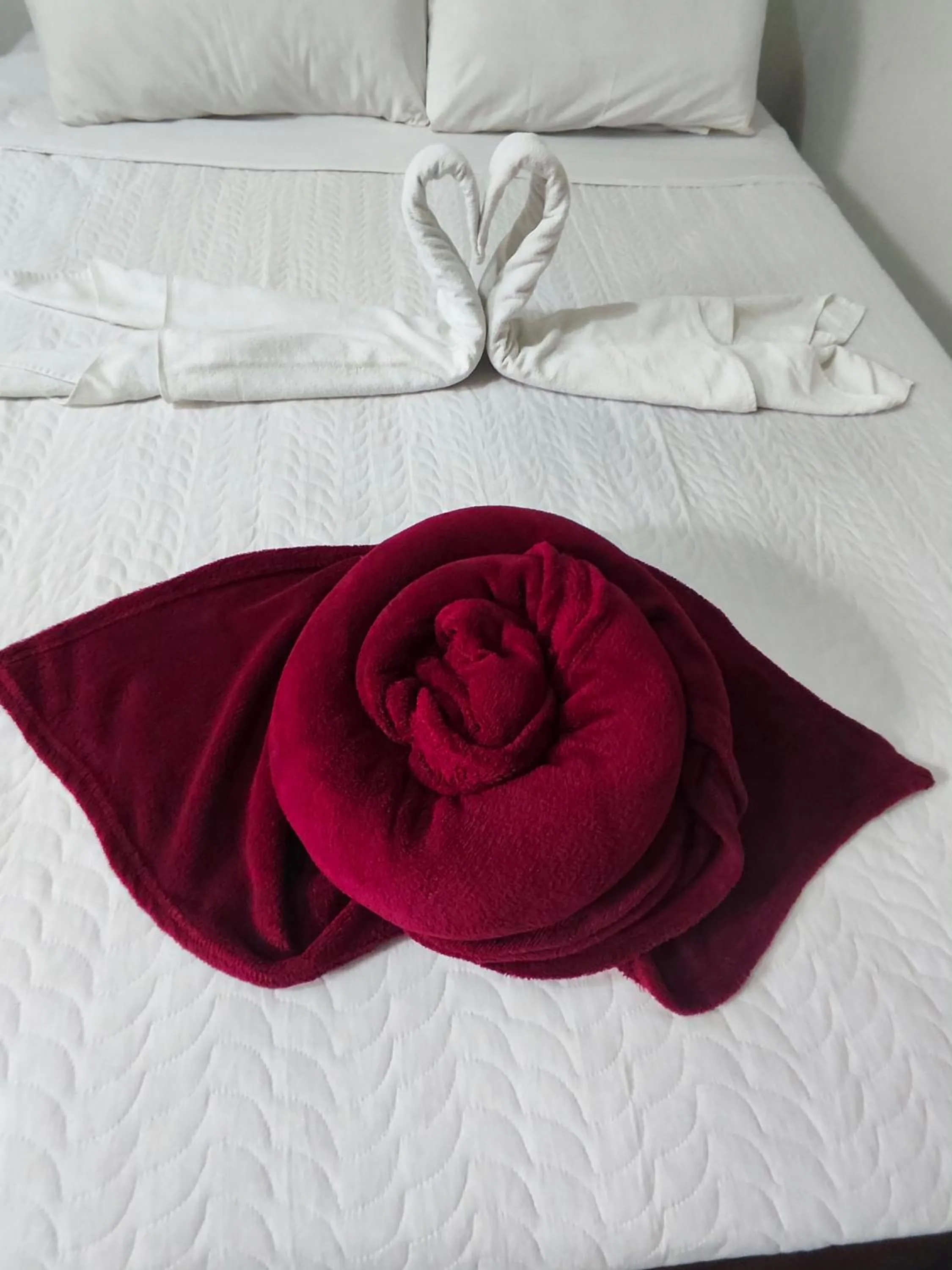 Bed in Pousada Flor de Lis