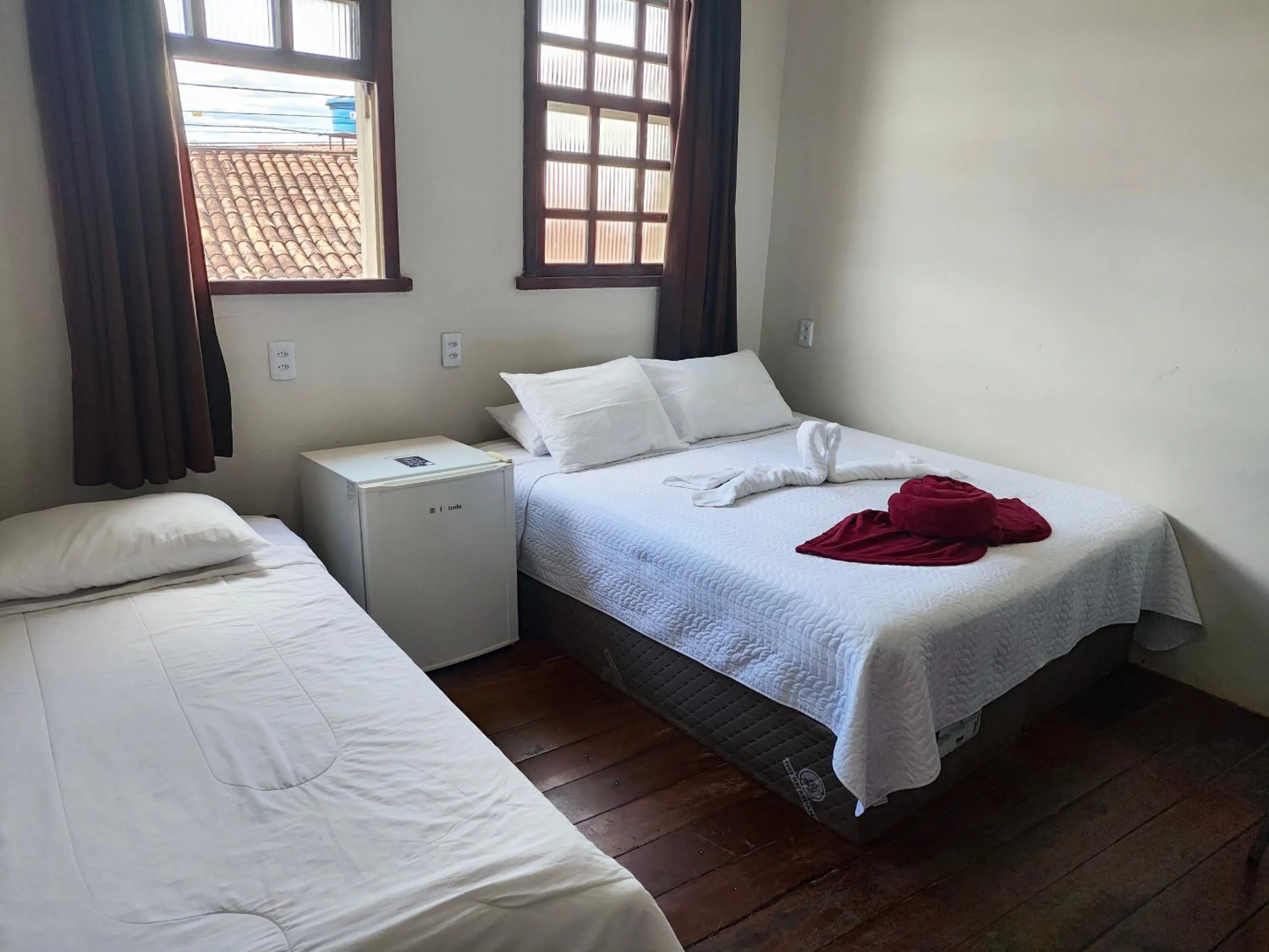 Bed in Pousada Flor de Lis