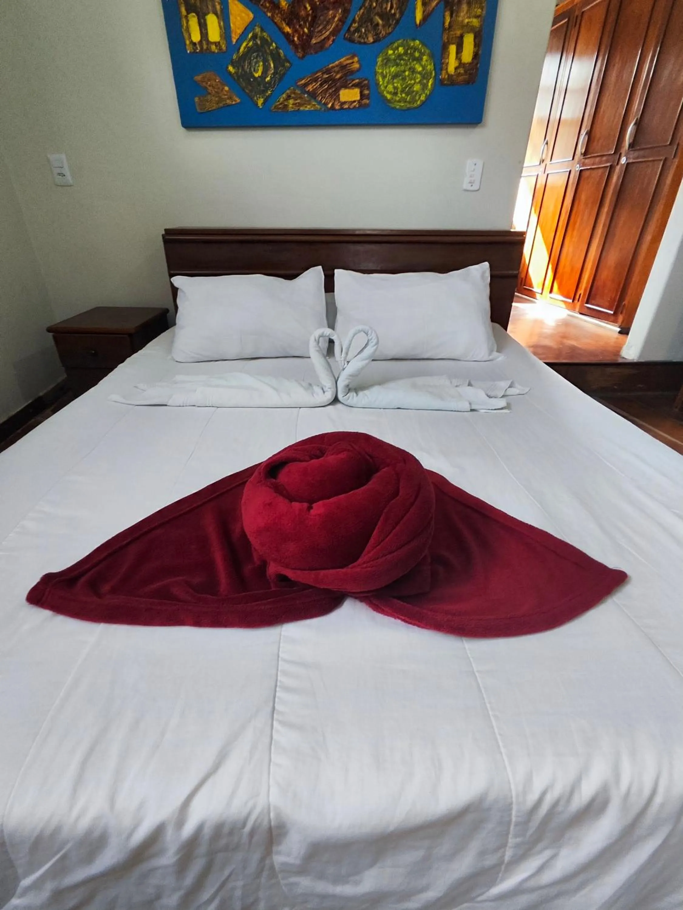 Bed in Pousada Flor de Lis