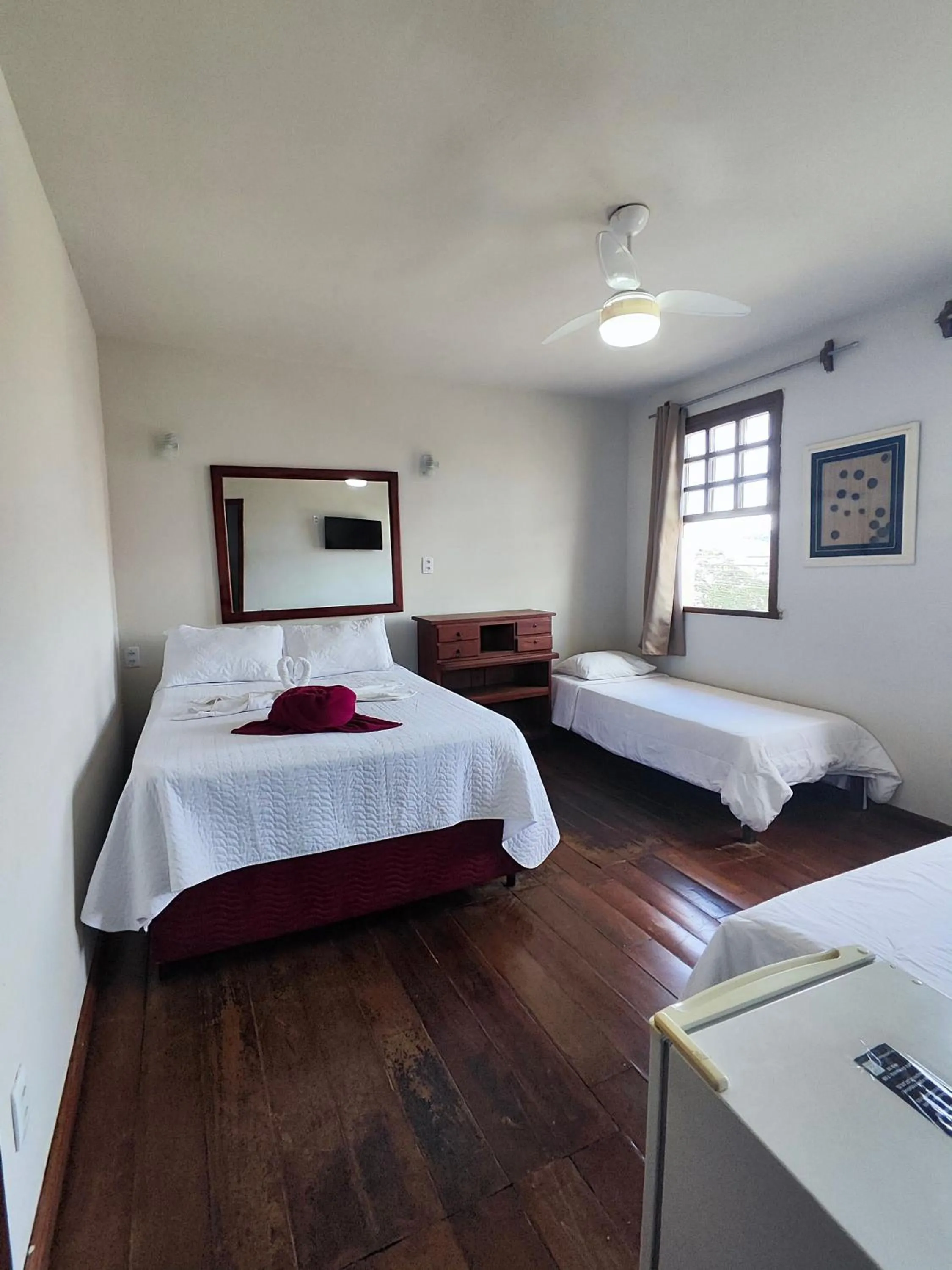 Bed in Pousada Flor de Lis