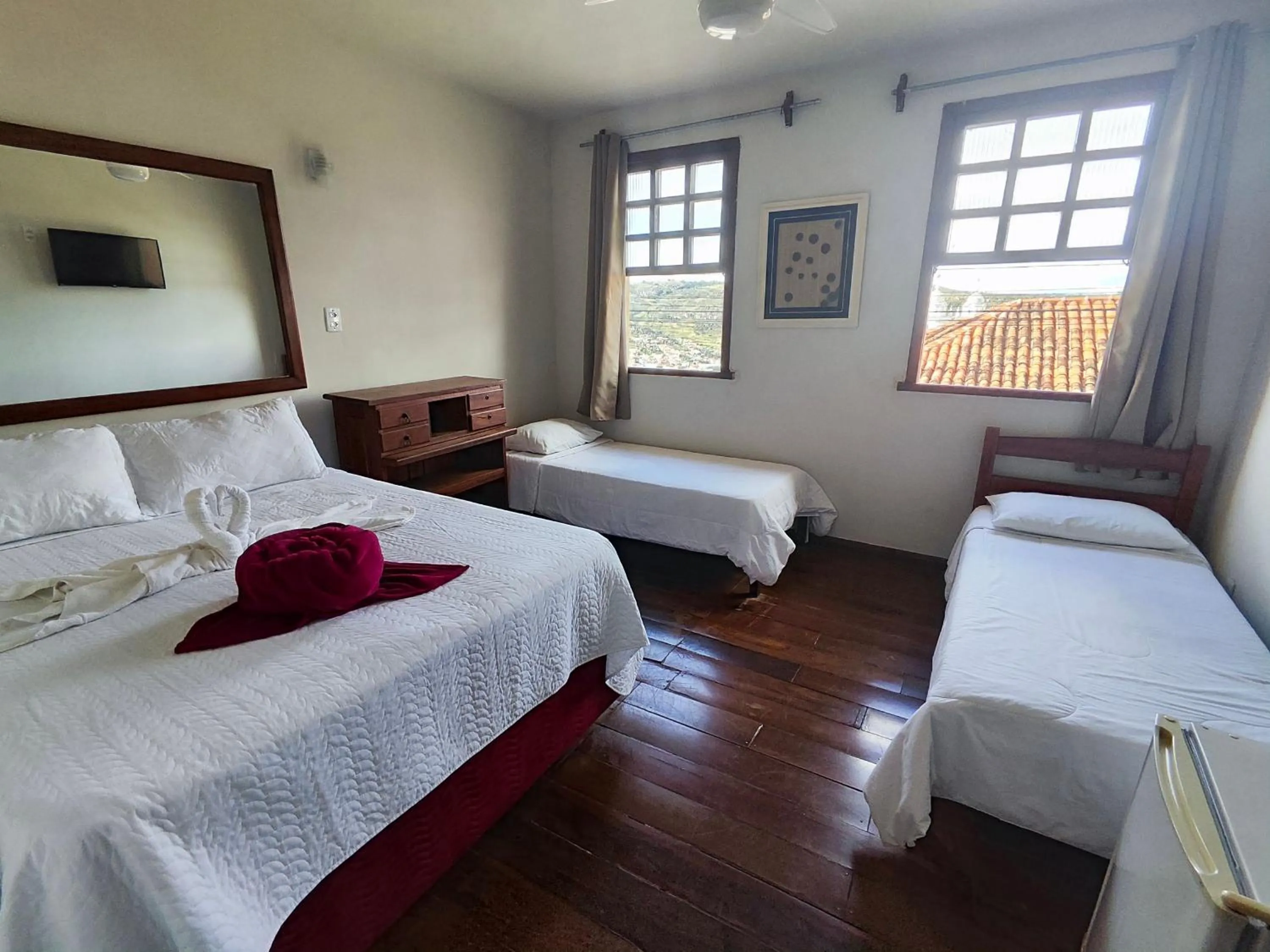 Bed in Pousada Flor de Lis