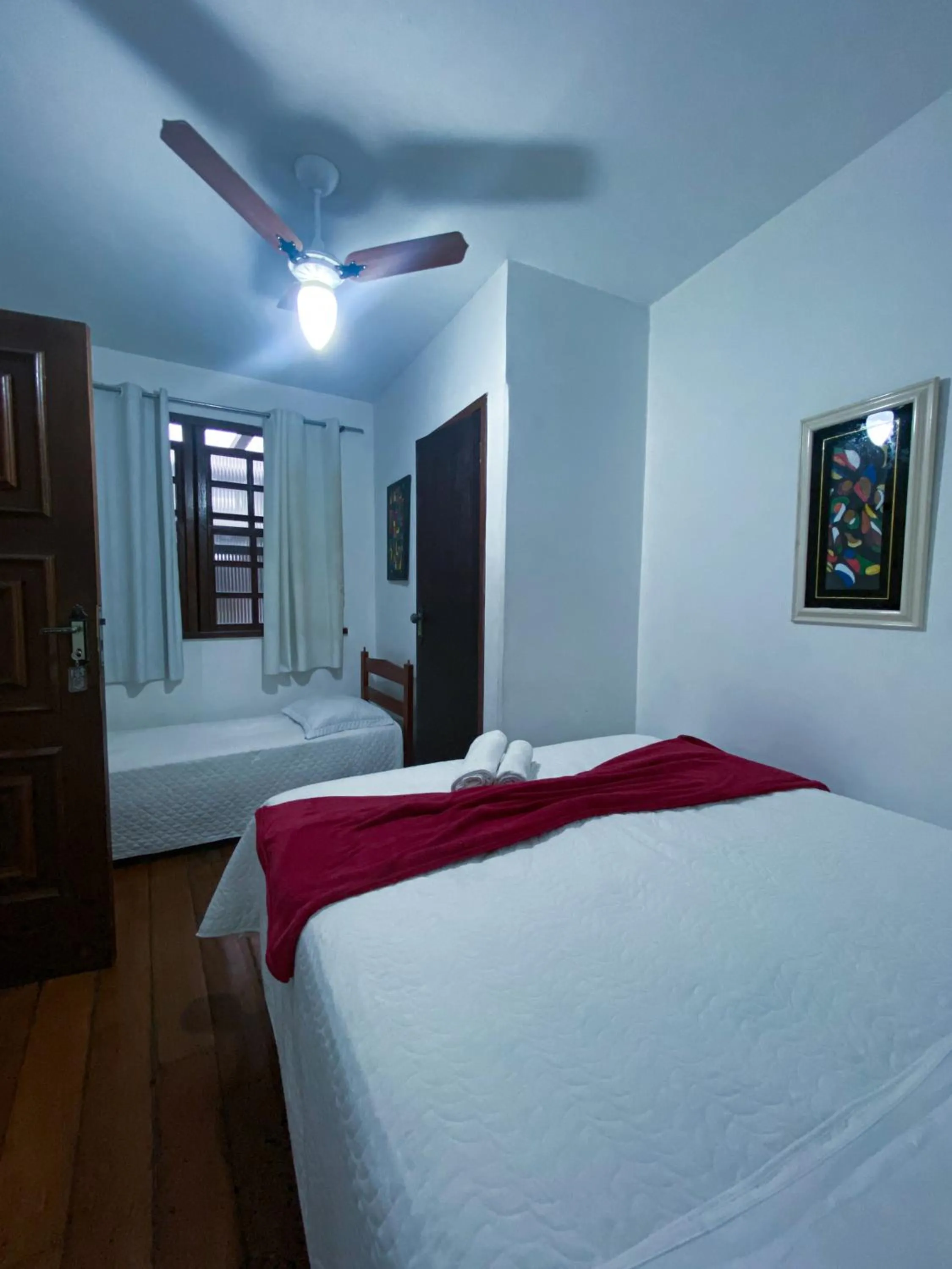 Bed in Pousada Flor de Lis