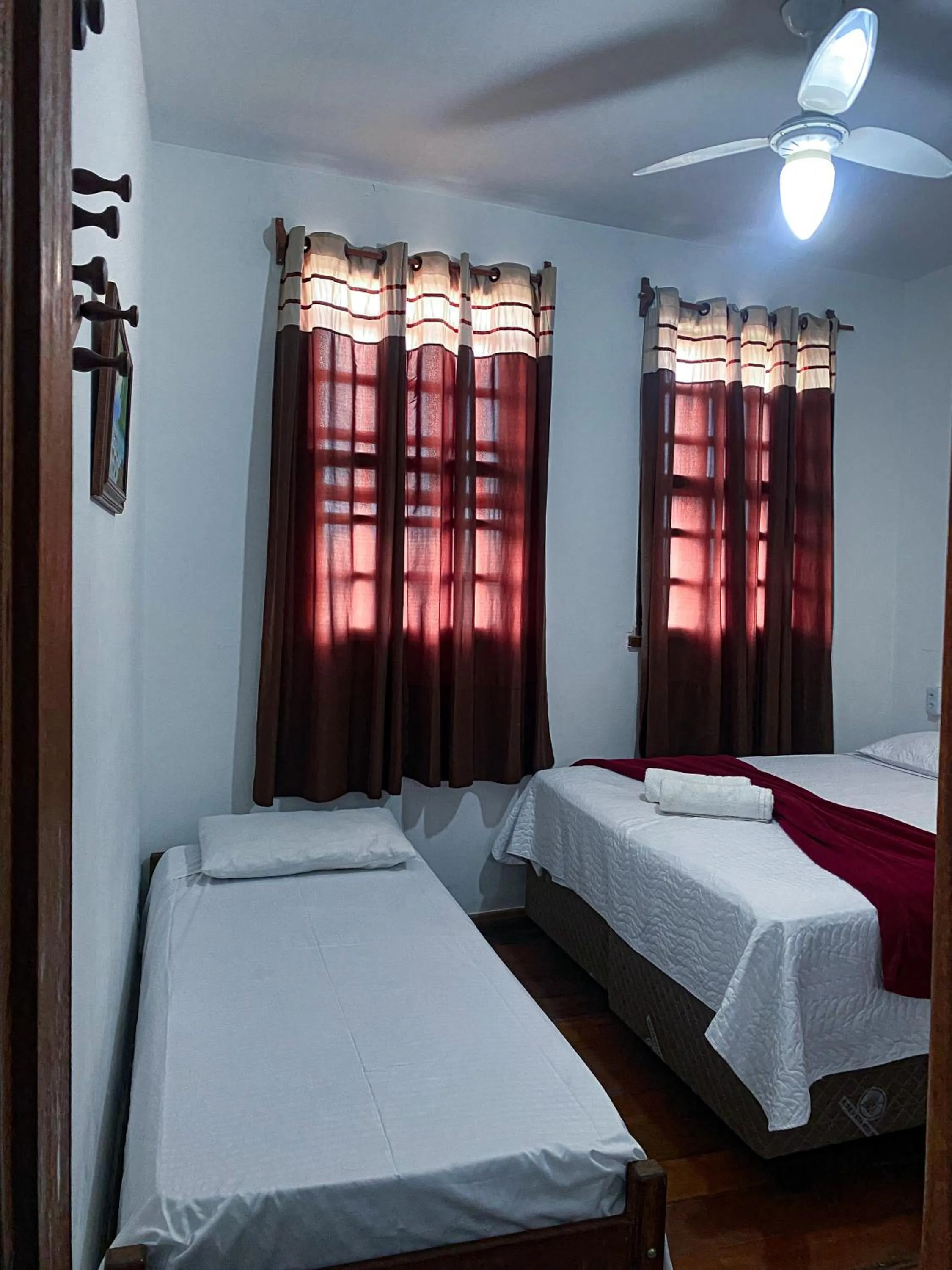 Bed in Pousada Flor de Lis