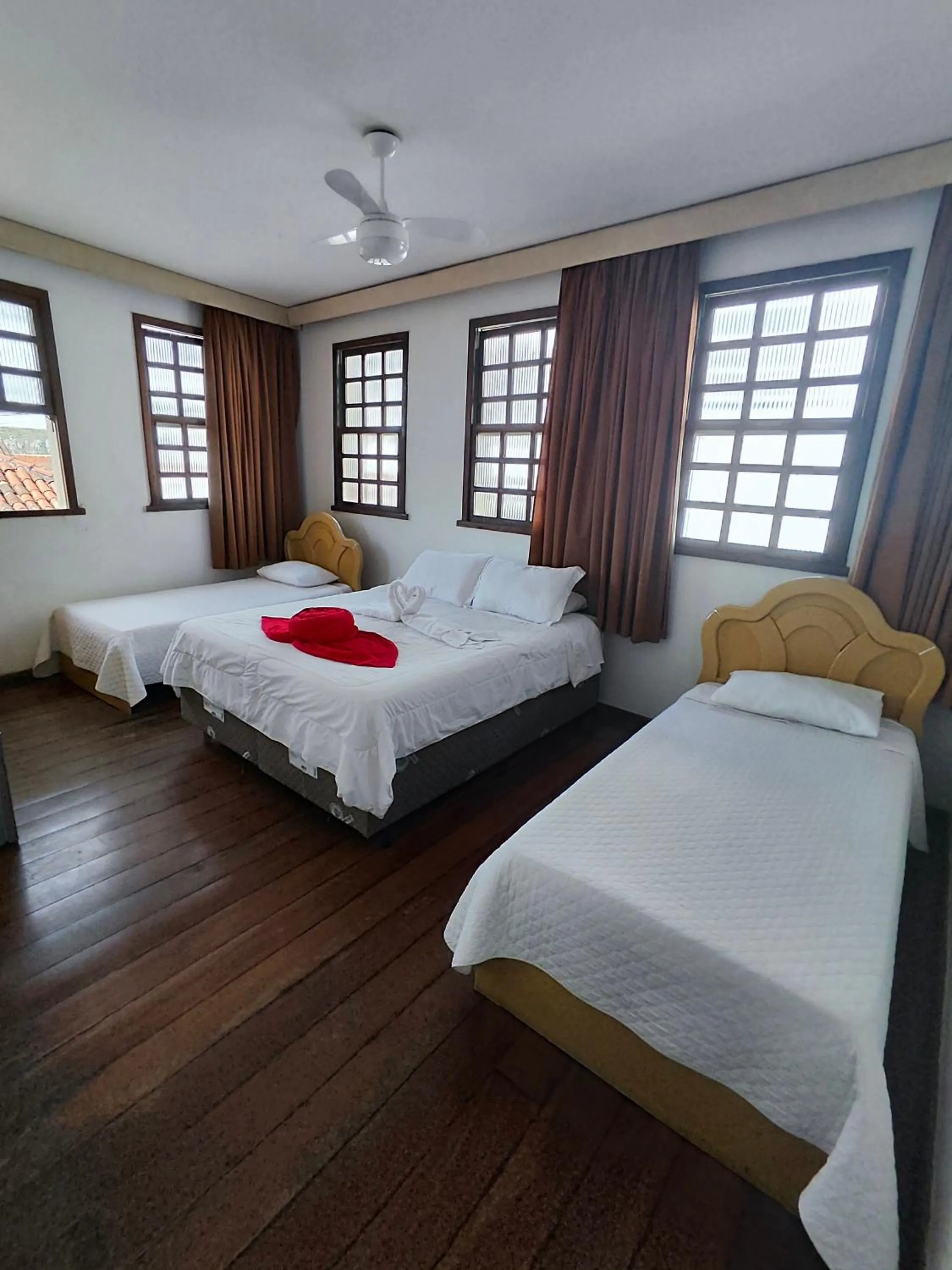 Bed in Pousada Flor de Lis