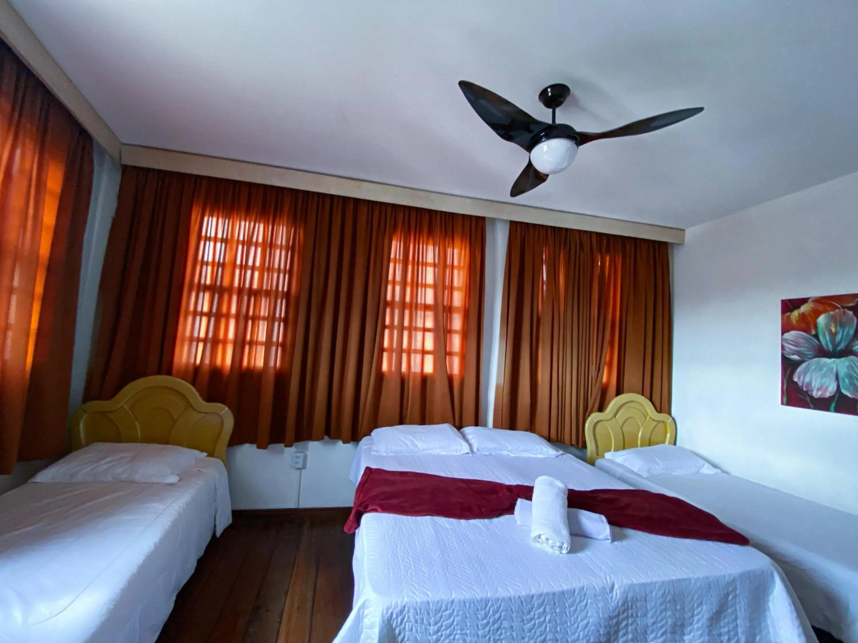 Bed in Pousada Flor de Lis