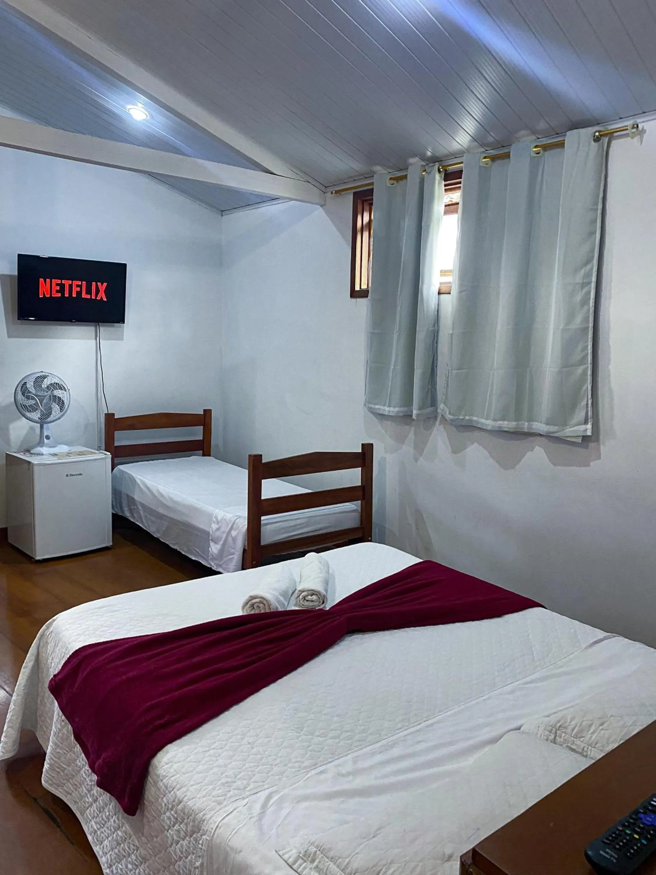 Bed in Pousada Flor de Lis