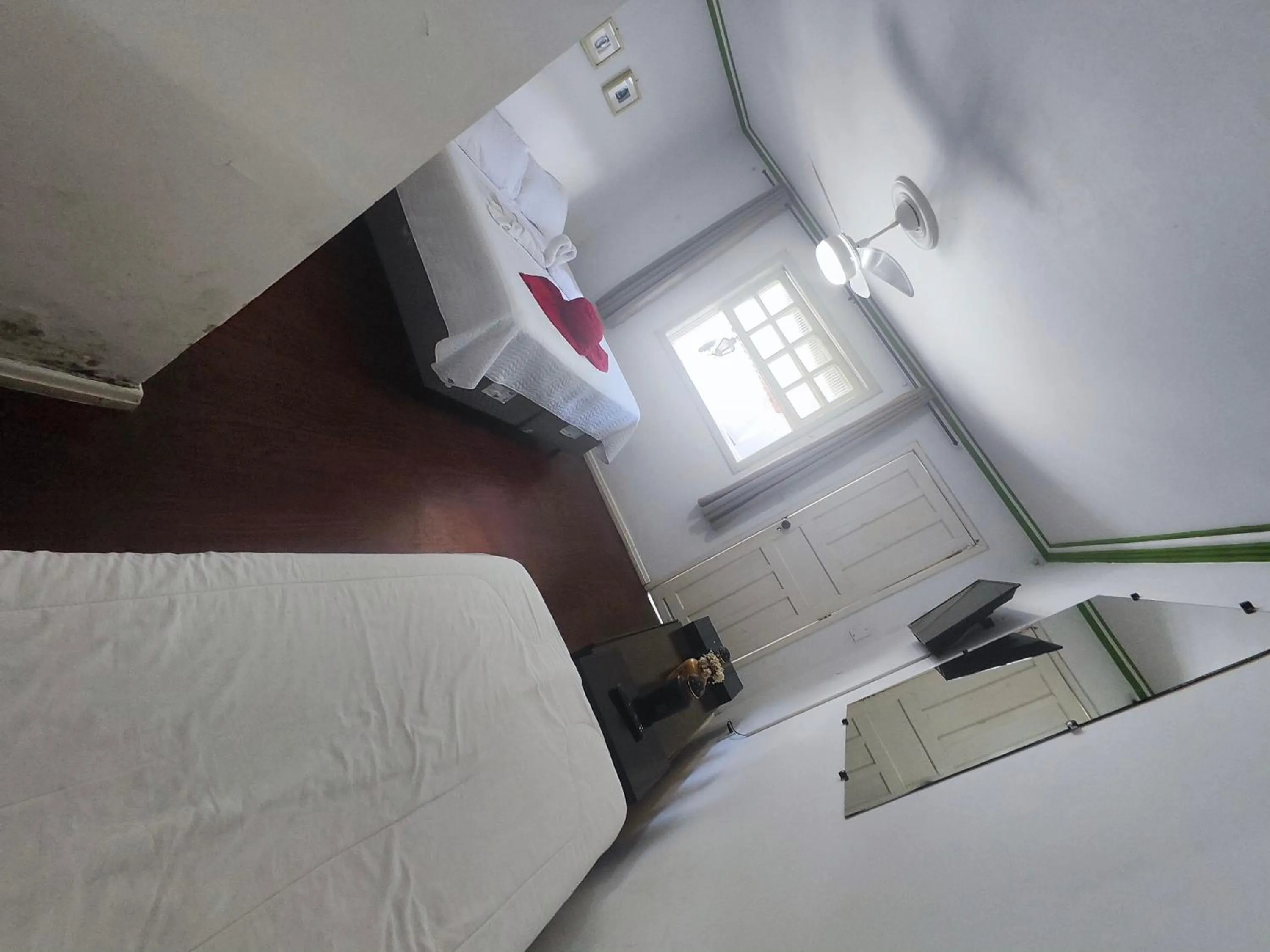 Bed in Pousada Flor de Lis