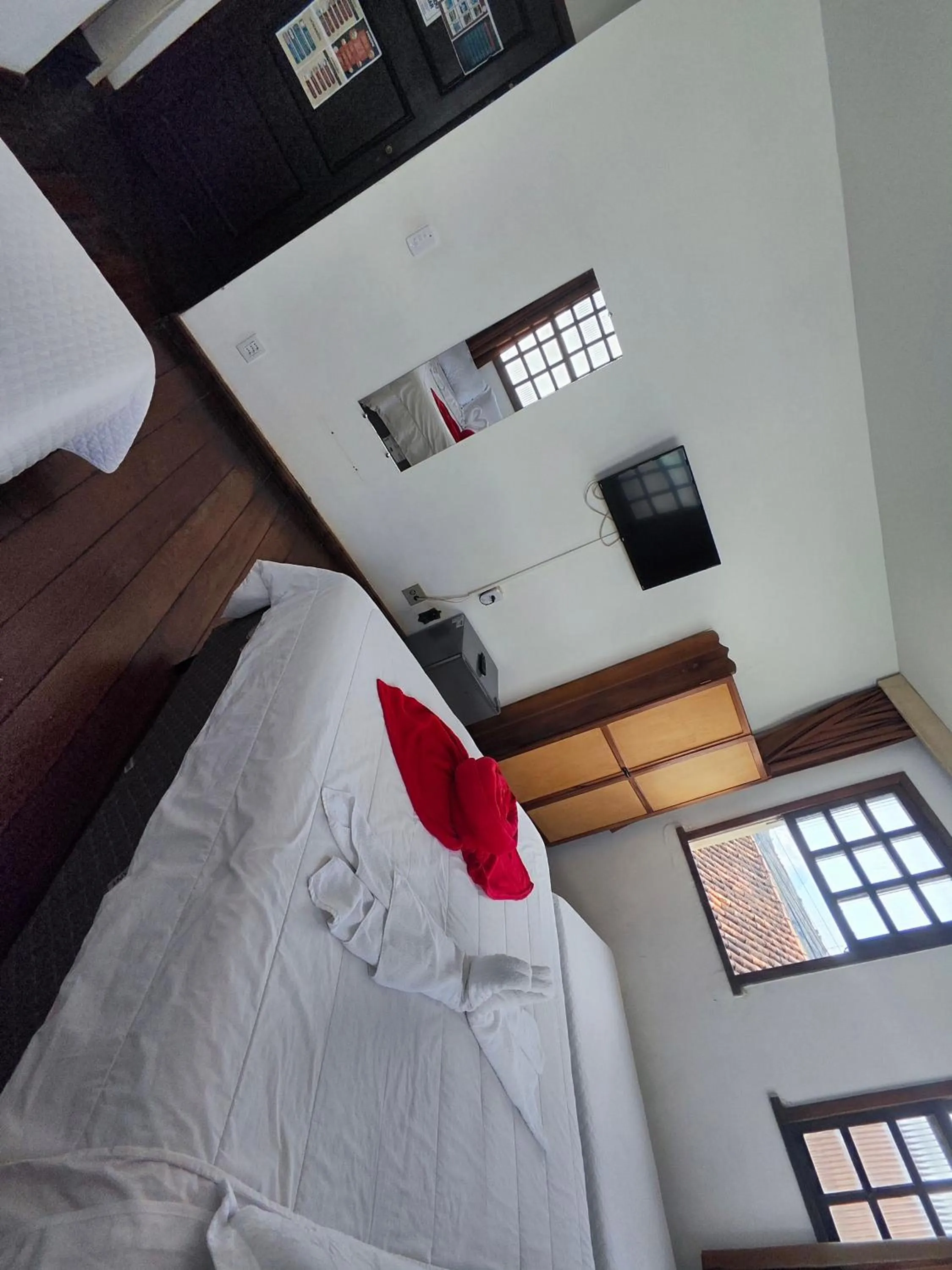 Bed in Pousada Flor de Lis