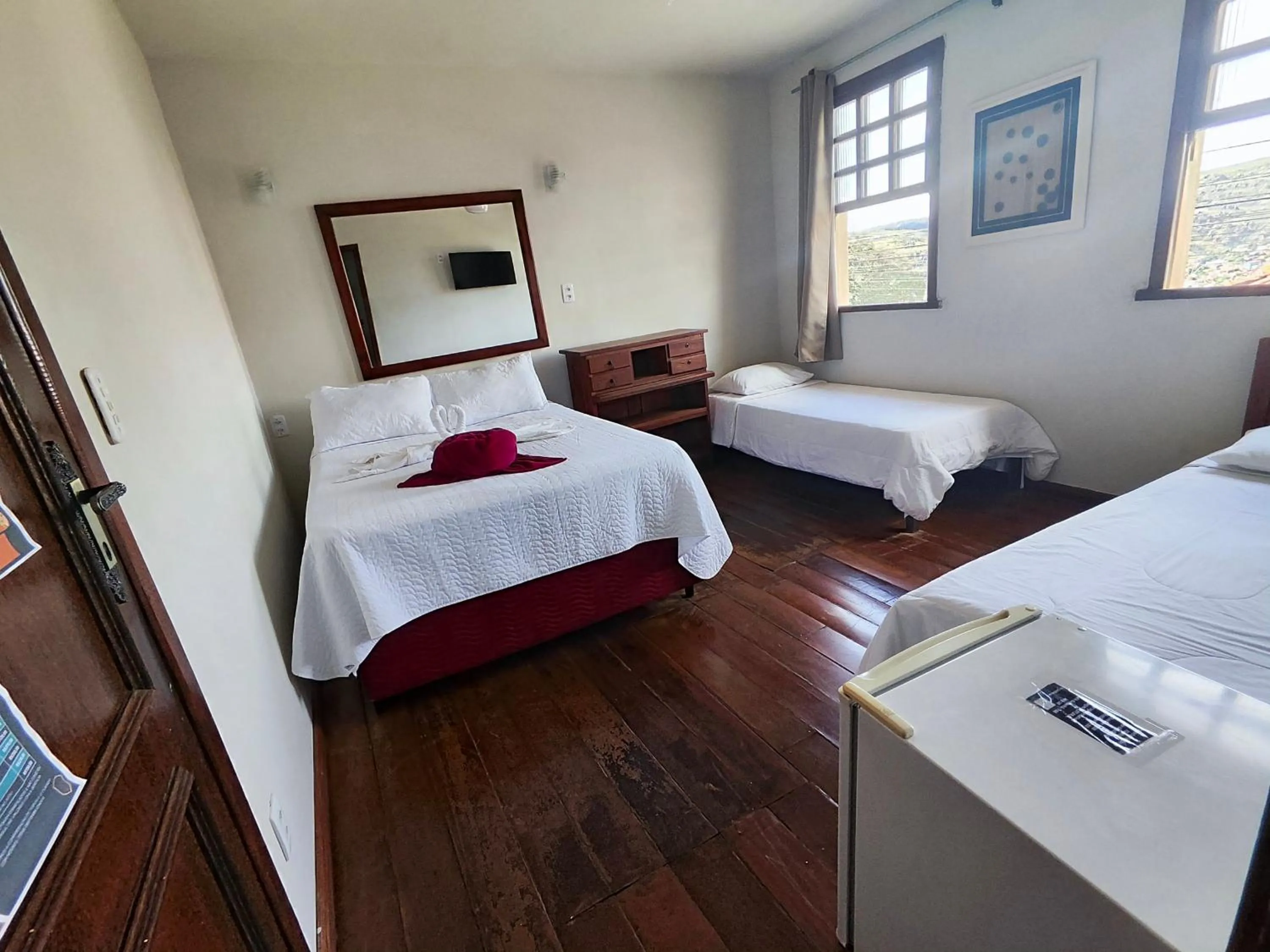 Bed in Pousada Flor de Lis